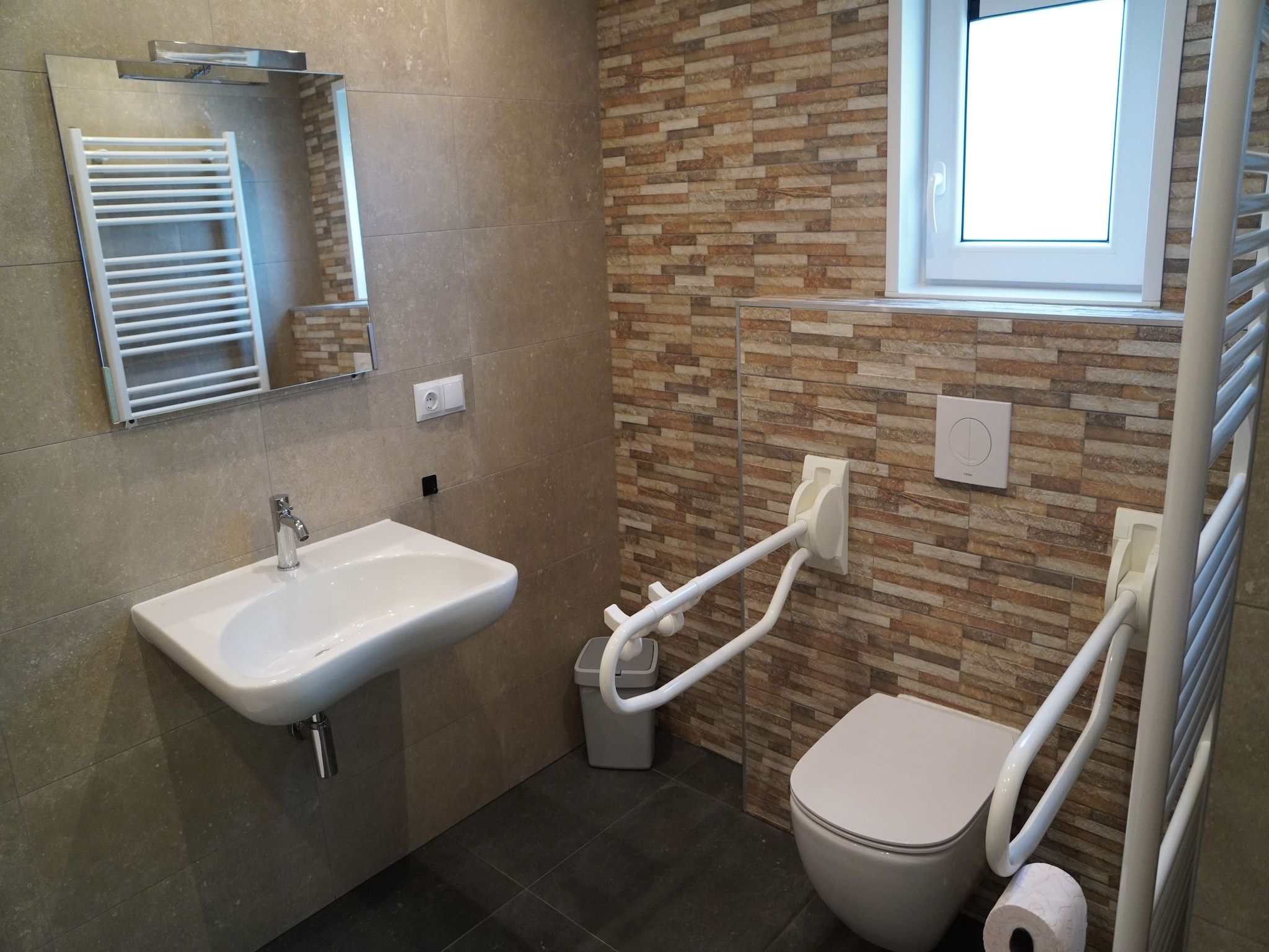 De badkamer van Vakantiepark De Rimboe & De Woeste Hoogte 25 in Hoenderloo