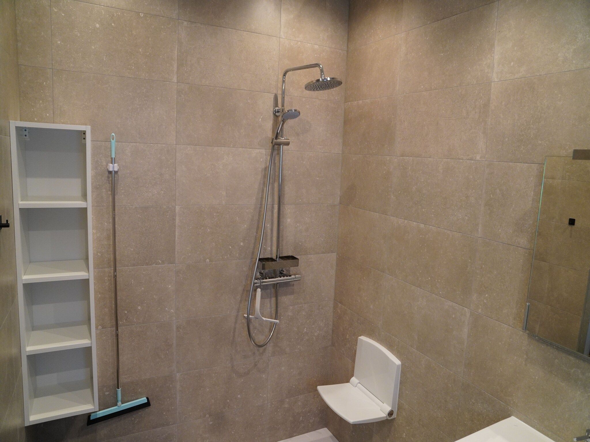 De badkamer van Vakantiepark De Rimboe & De Woeste Hoogte 25 in Hoenderloo