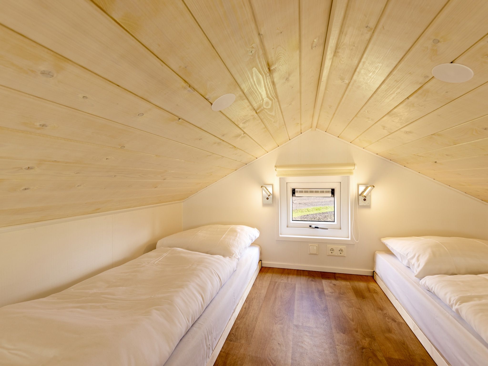 Een slaapkamer van Recreatiepark Tolplas 19 in Hoge Hexel