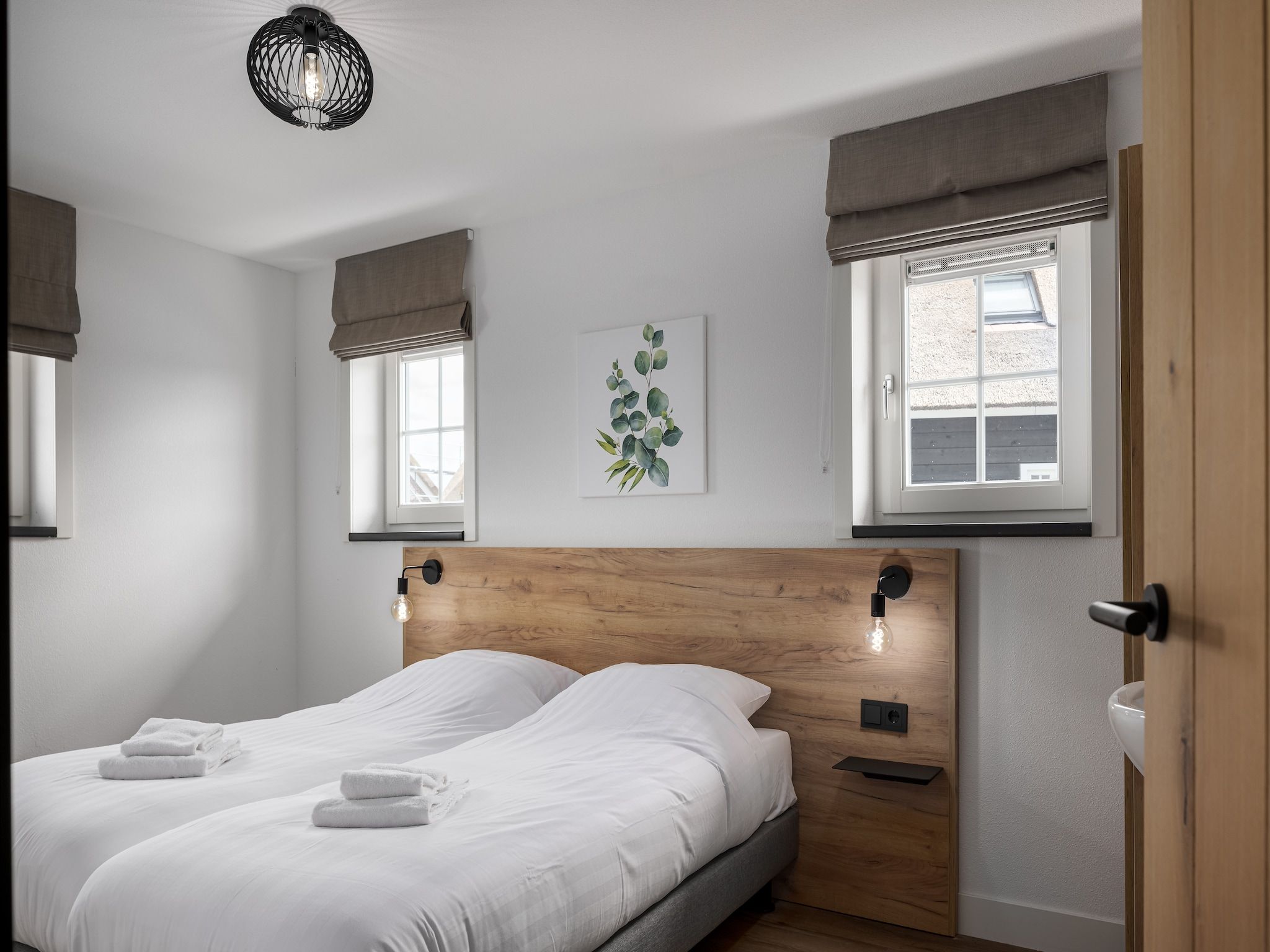 Een slaapkamer van Vakantiepark De Heihorsten 3 in Someren