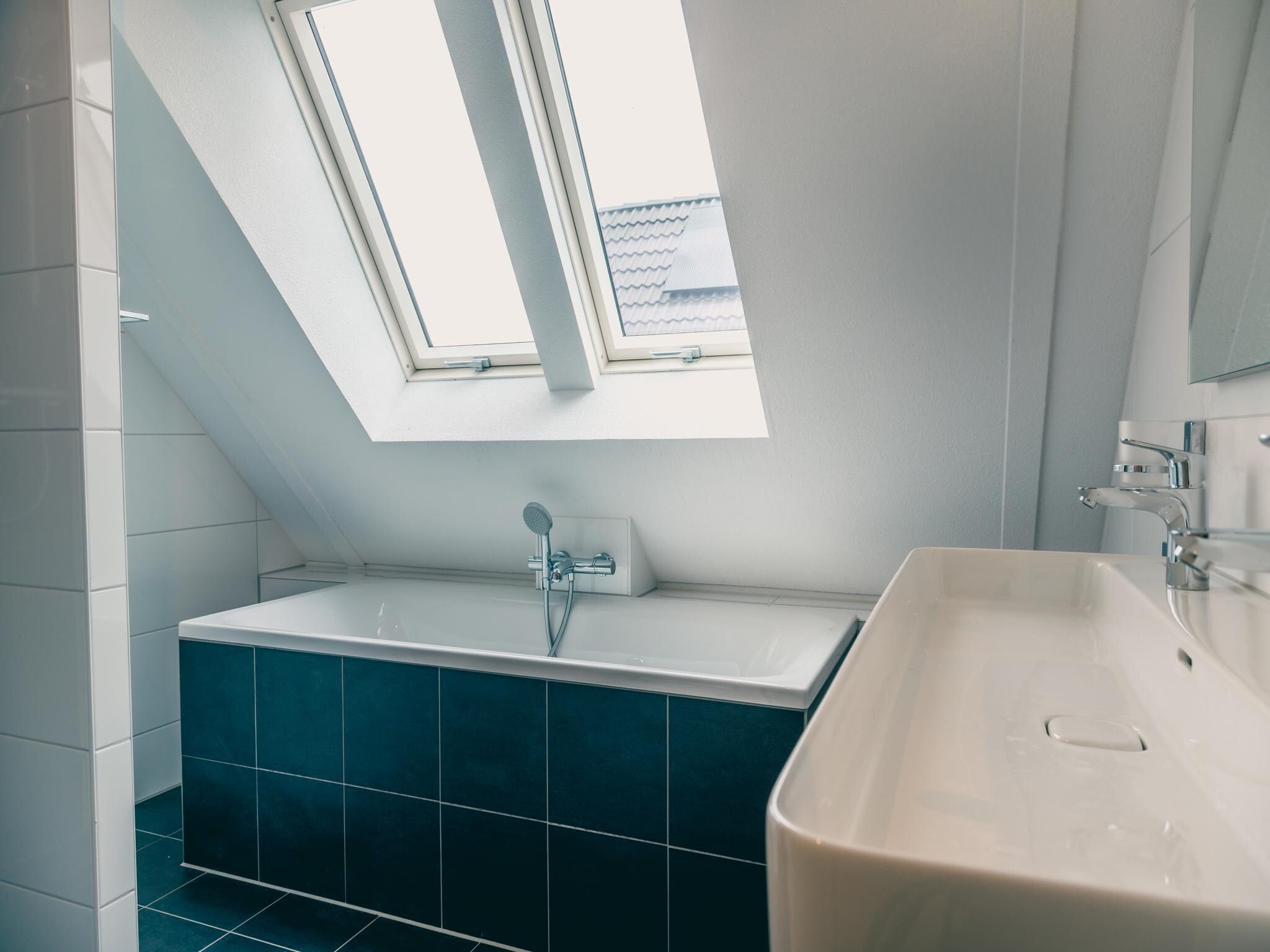 De badkamer van Watervilla Sauna 6 in Medemblik