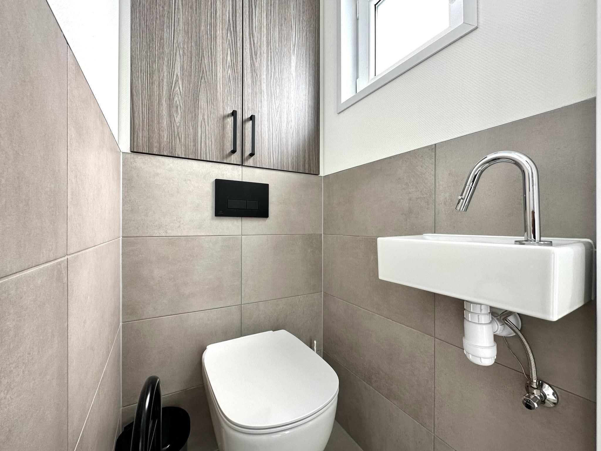 De badkamer van Vakantiepark De Rimboe & De Woeste Hoogte 28 in Hoenderloo