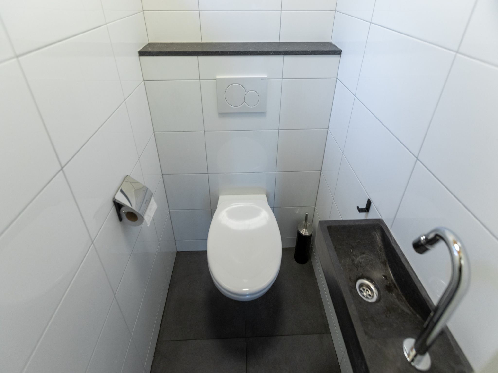 De badkamer van Vakantie bij Meeussen - Schuttersoord 4 in Mook