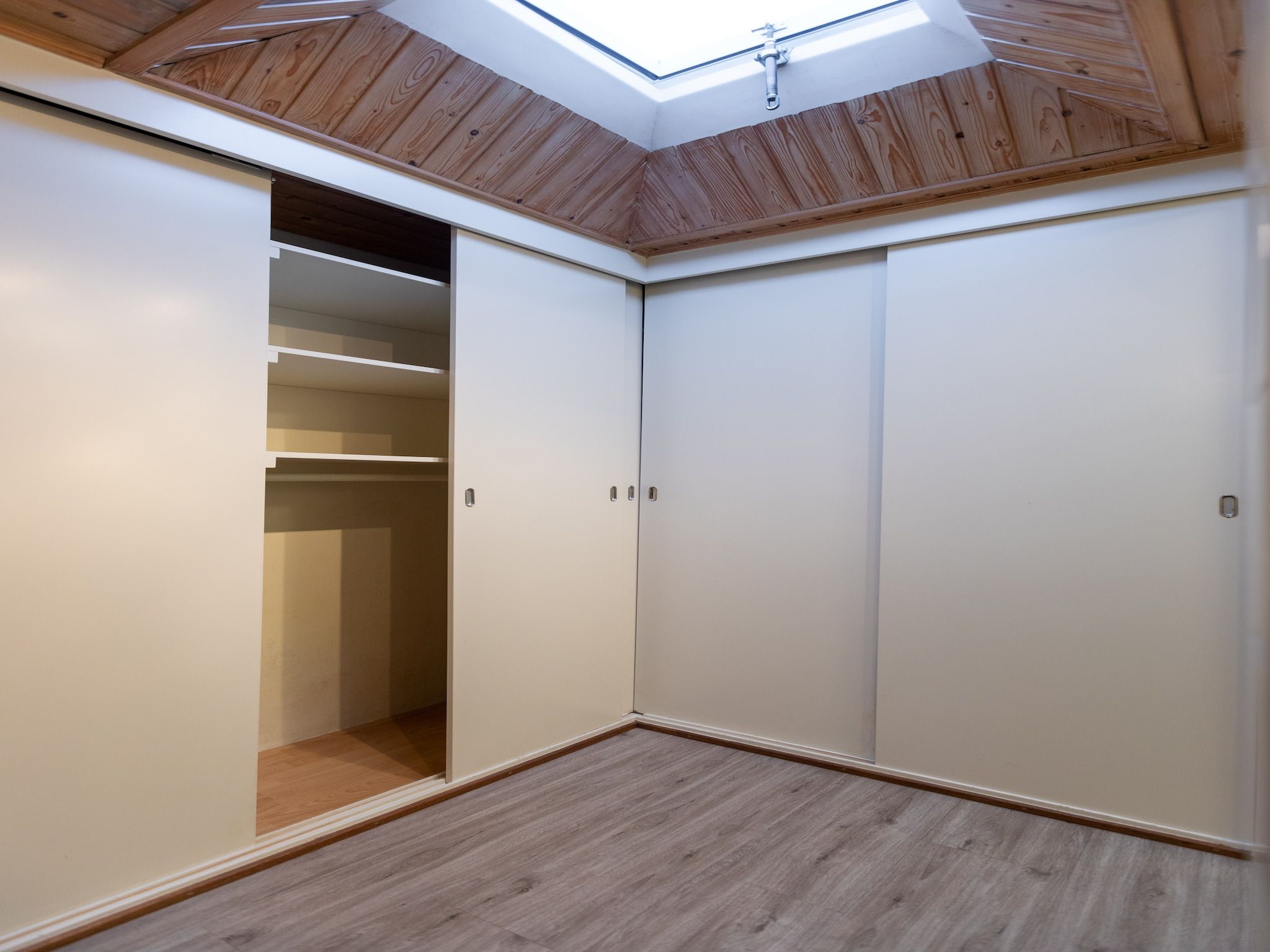 Een slaapkamer van Vakantie bij Meeussen - Schuttersoord 4 in Mook