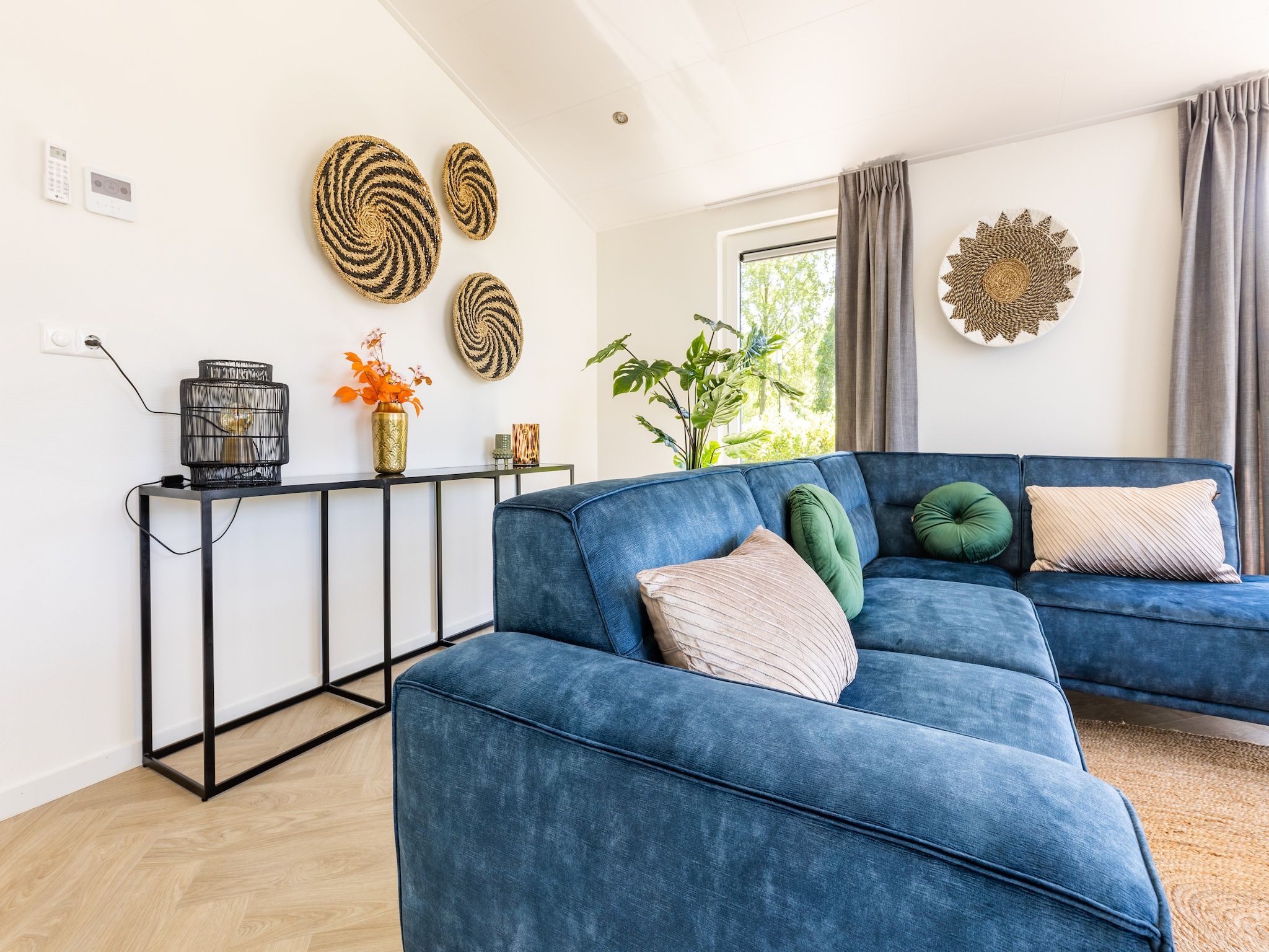 De woonkamer van Vakantiepark Molenvelden 3 in Veldhoven