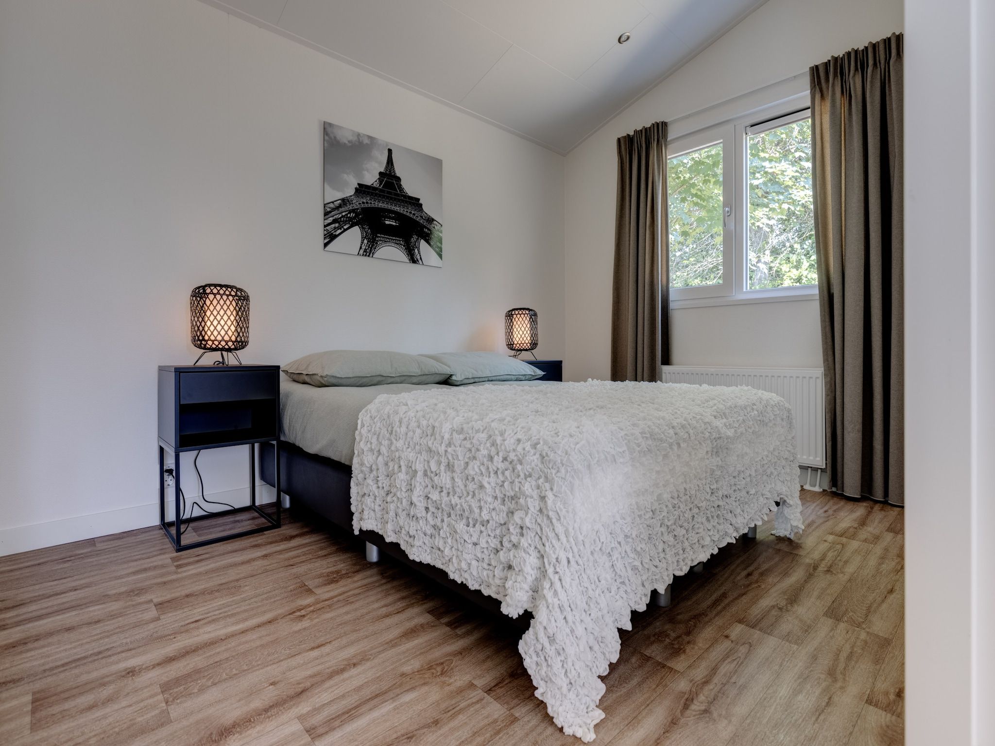 Een slaapkamer van Vakantiepark Molenvelden 4 in Veldhoven