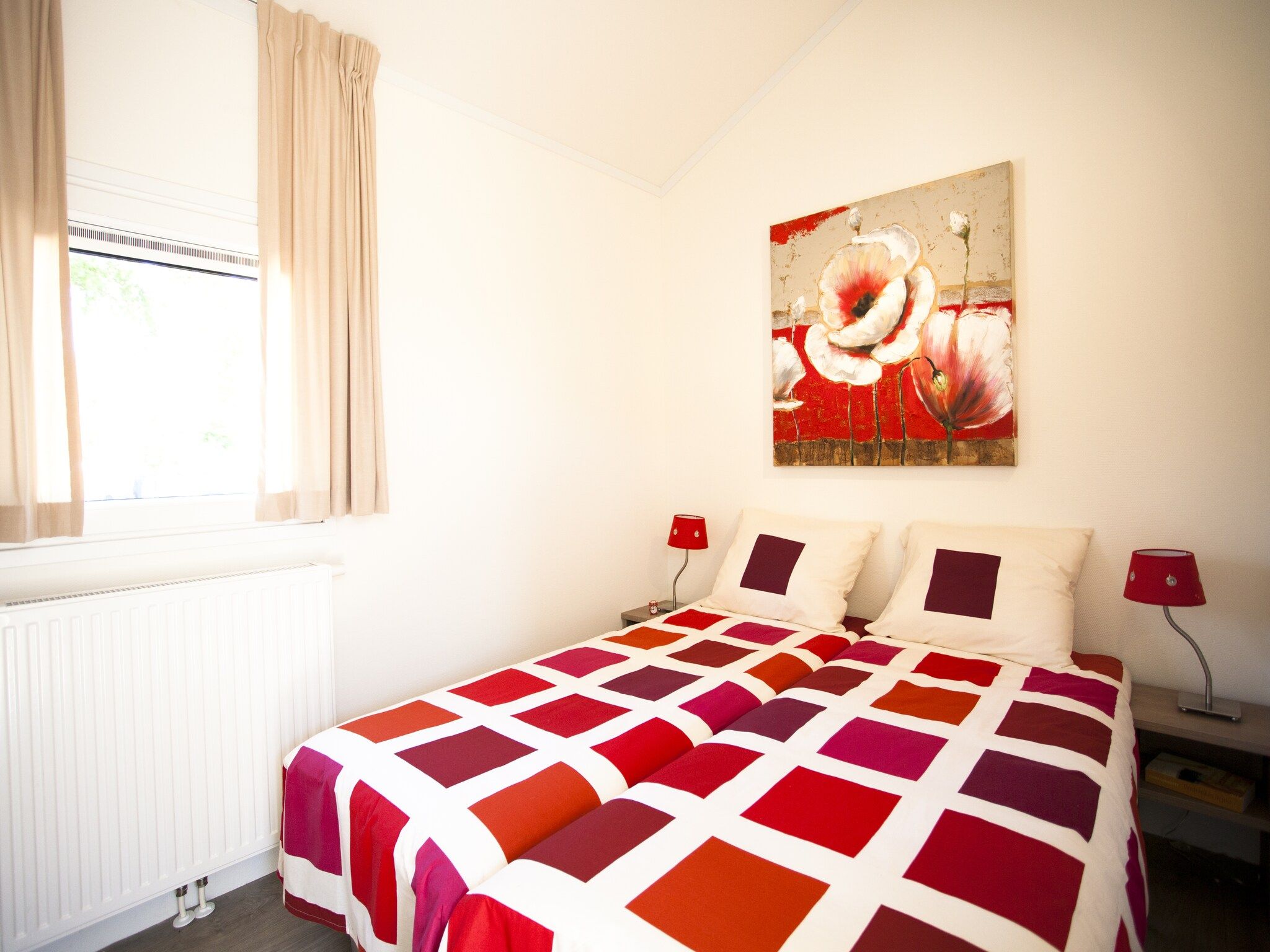 Een slaapkamer van Cabana 4 in Breskens