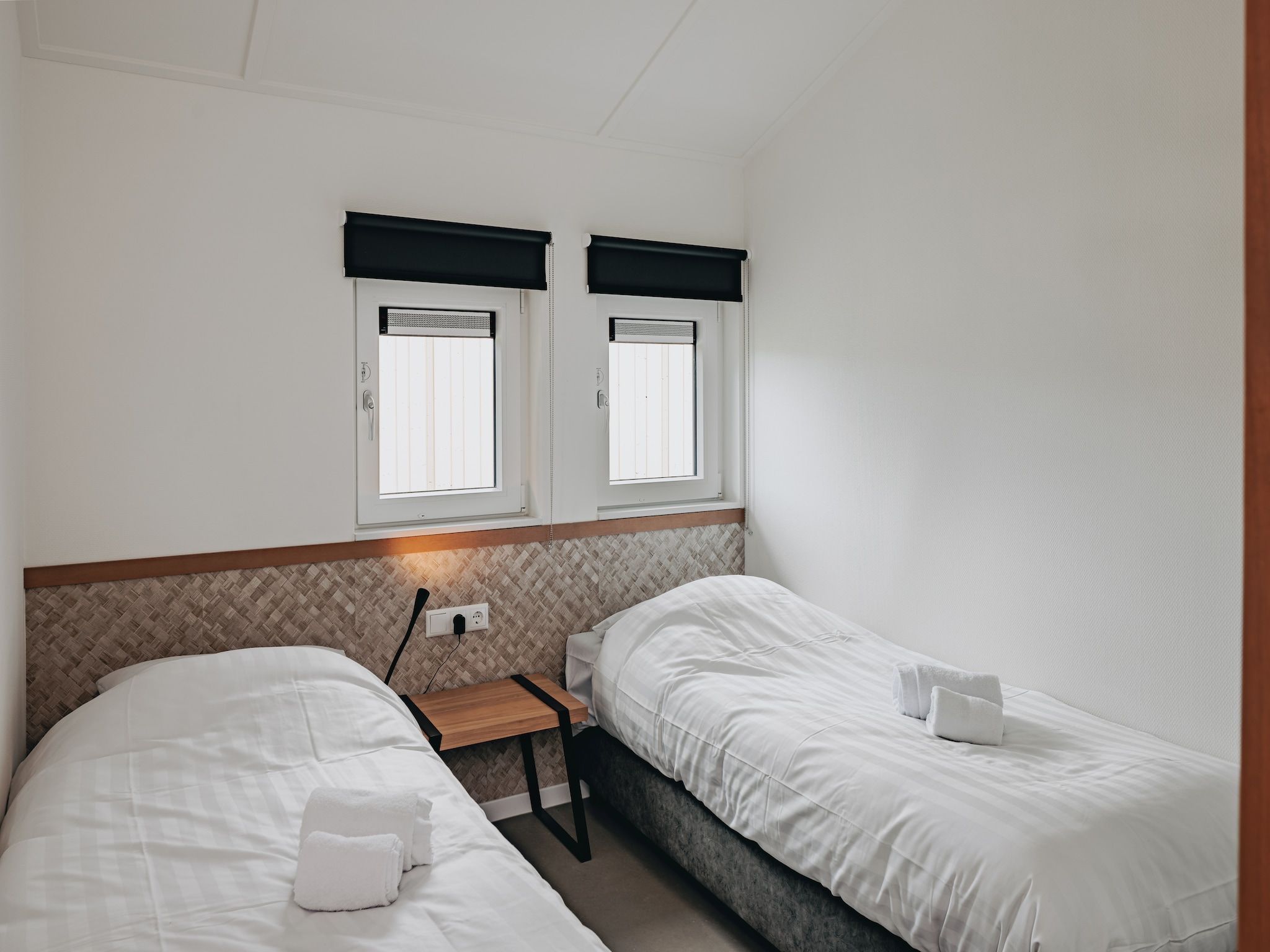 Een slaapkamer van Vakantiepark Zeebad 12 in Breskens