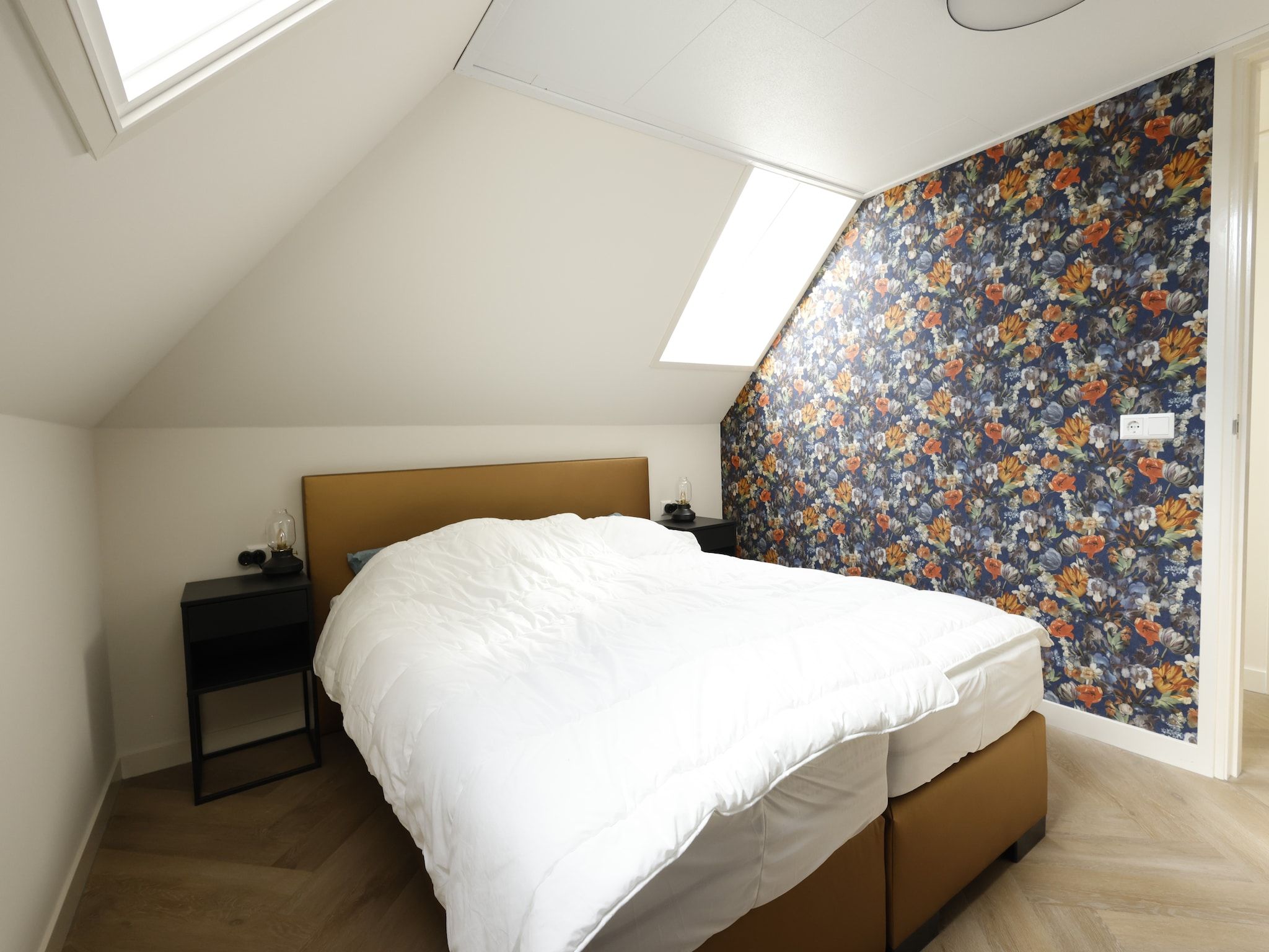 Een slaapkamer van Recreatiepark Wiringherlant - Wiringher Villa 23 in Hippolytushoef