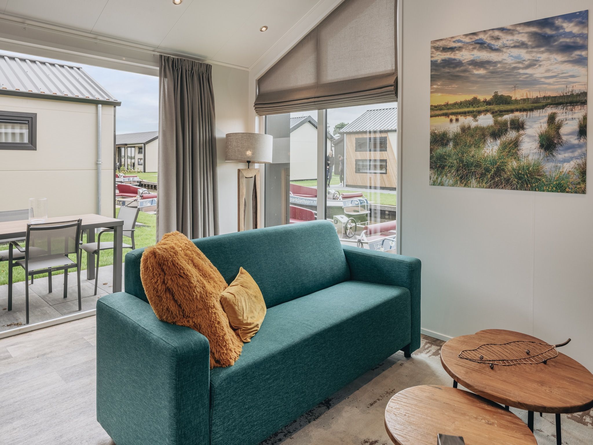 De woonkamer van Vakantiepark Giethoorn 9 in Giethoorn