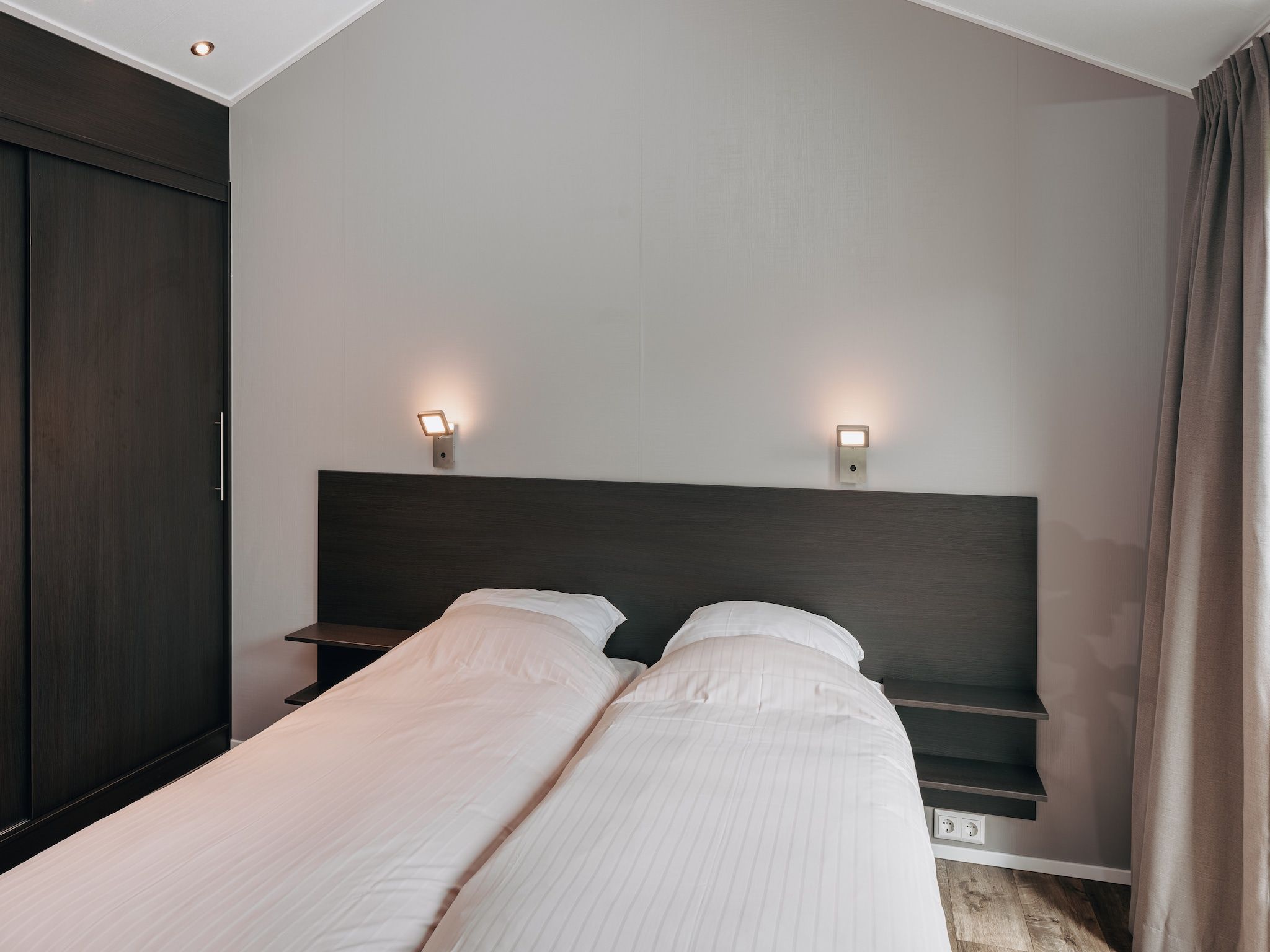 Een slaapkamer van Vakantiepark Giethoorn 9 in Giethoorn