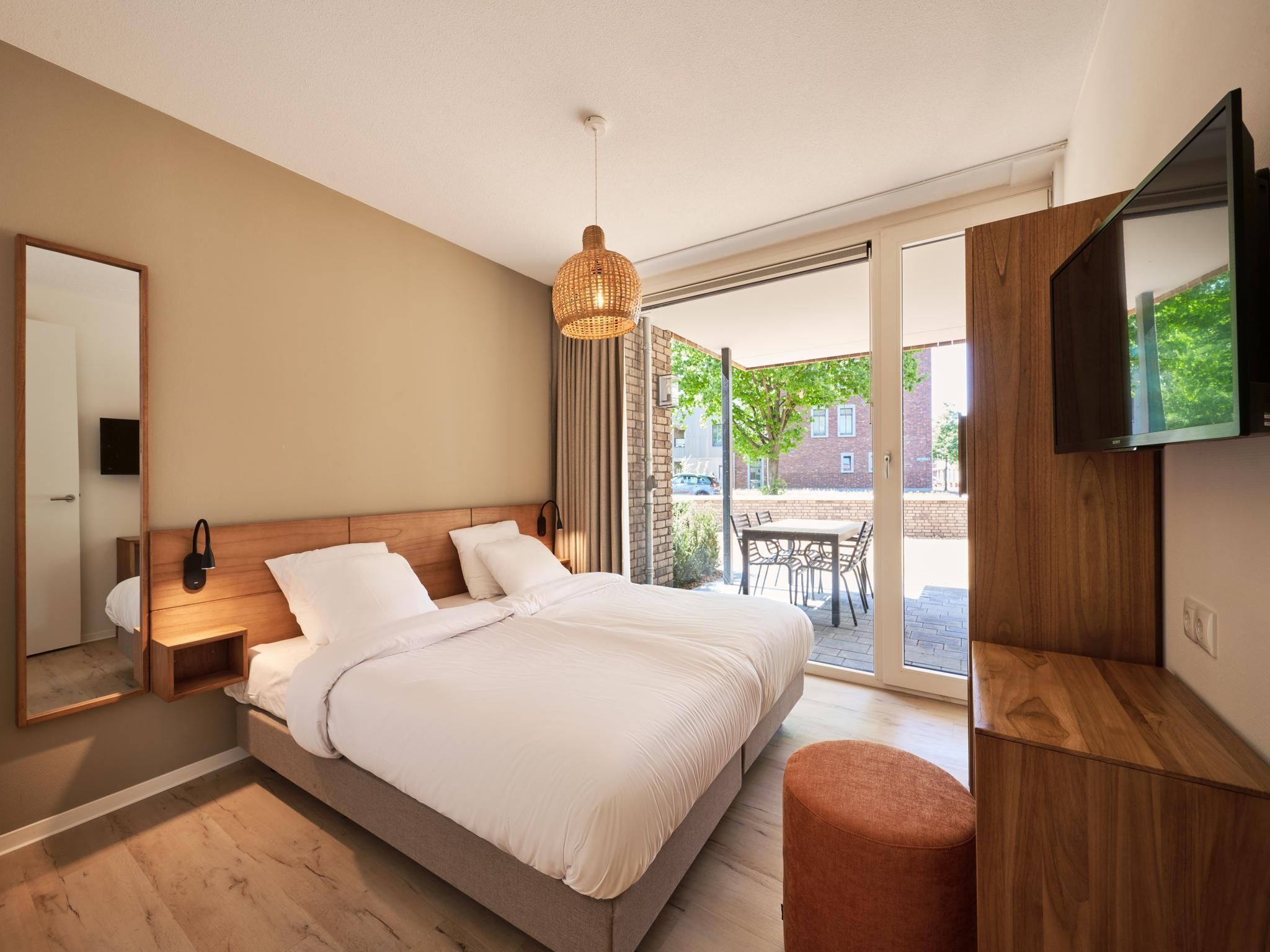 Een slaapkamer van Resort Maastricht 33 in Maastricht