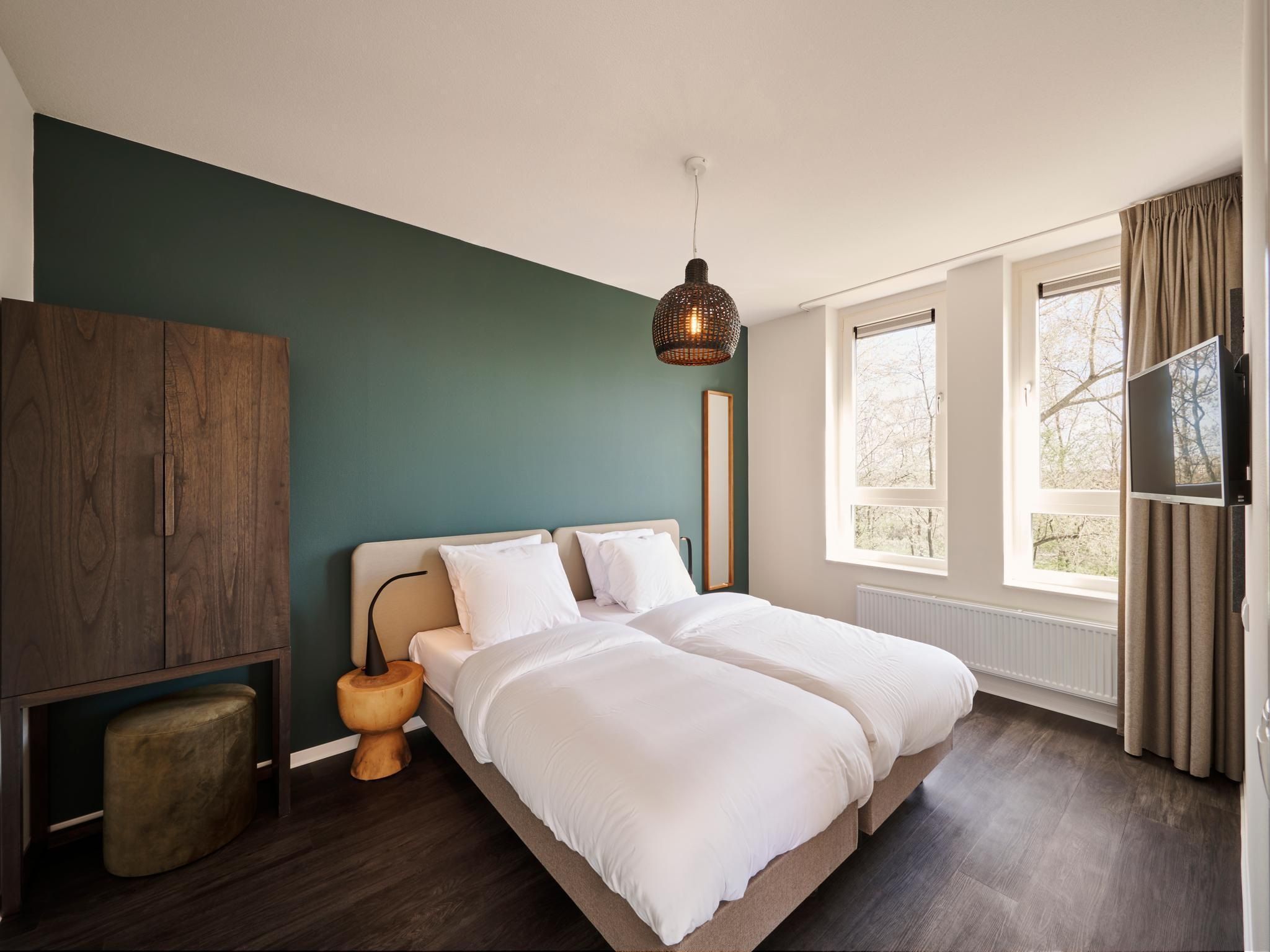 Een slaapkamer van Resort Maastricht 37 in Maastricht