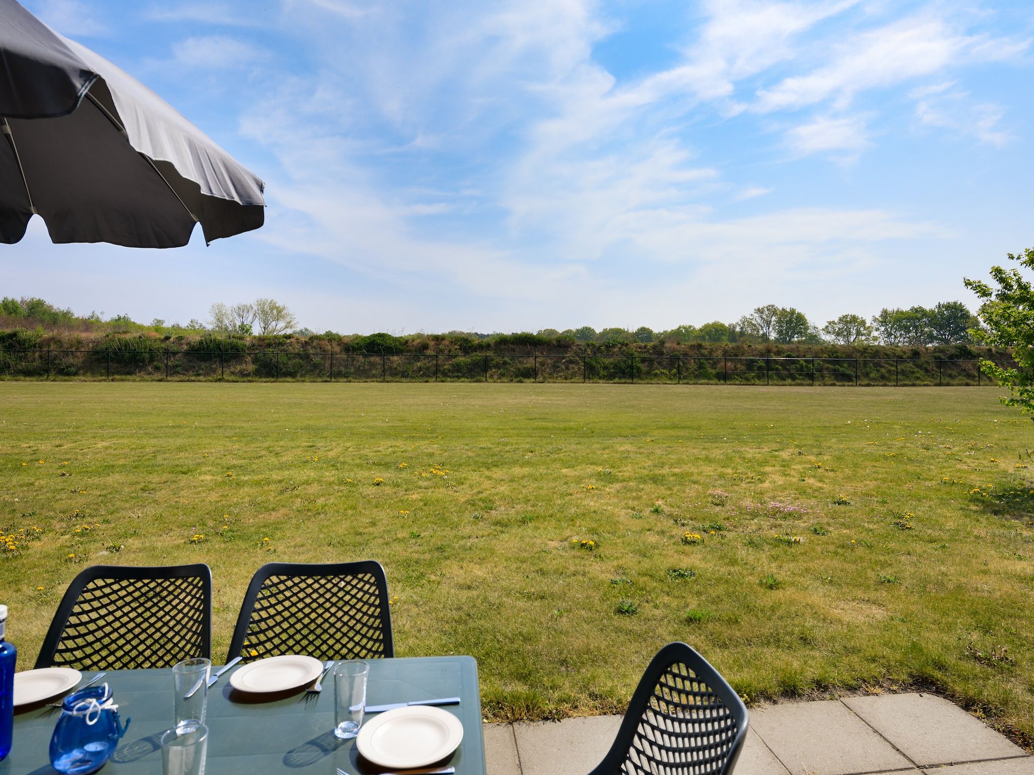 Het terras van Vakantiepark Klein Vink 9 in Arcen