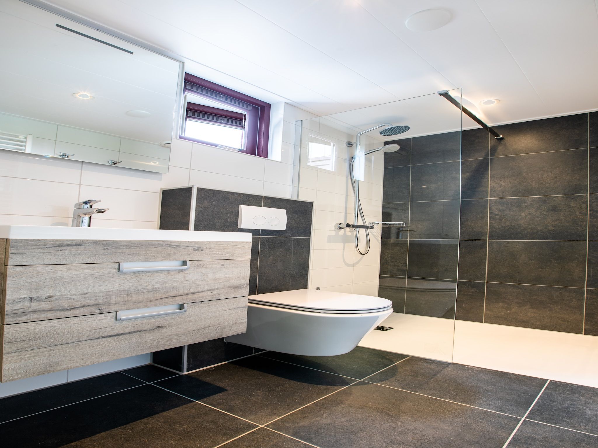 De badkamer van Vakantiepark Hof van Zeeland 1 in Heinkenszand