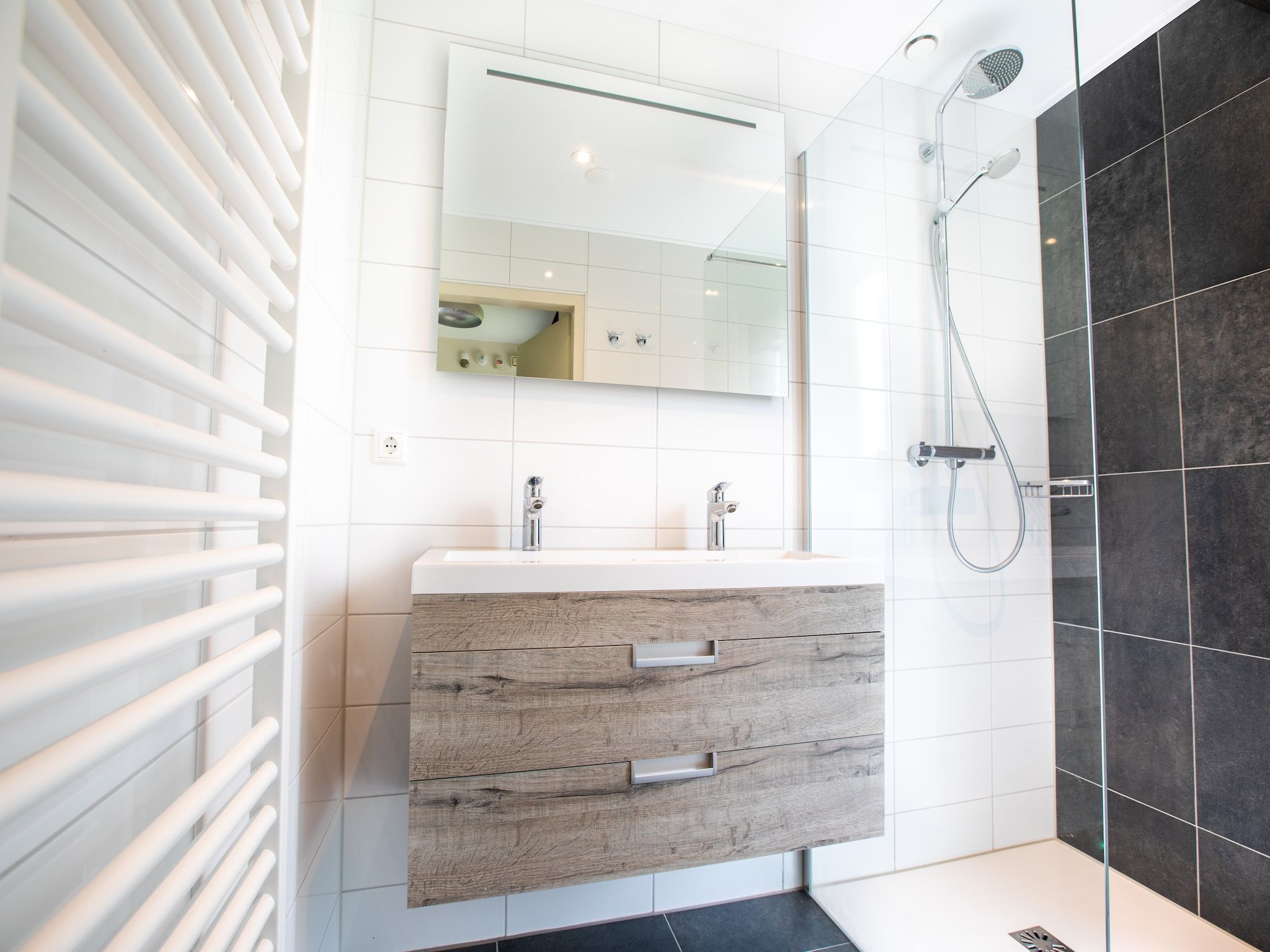 De badkamer van Vakantiepark Hof van Zeeland 2 in Heinkenszand