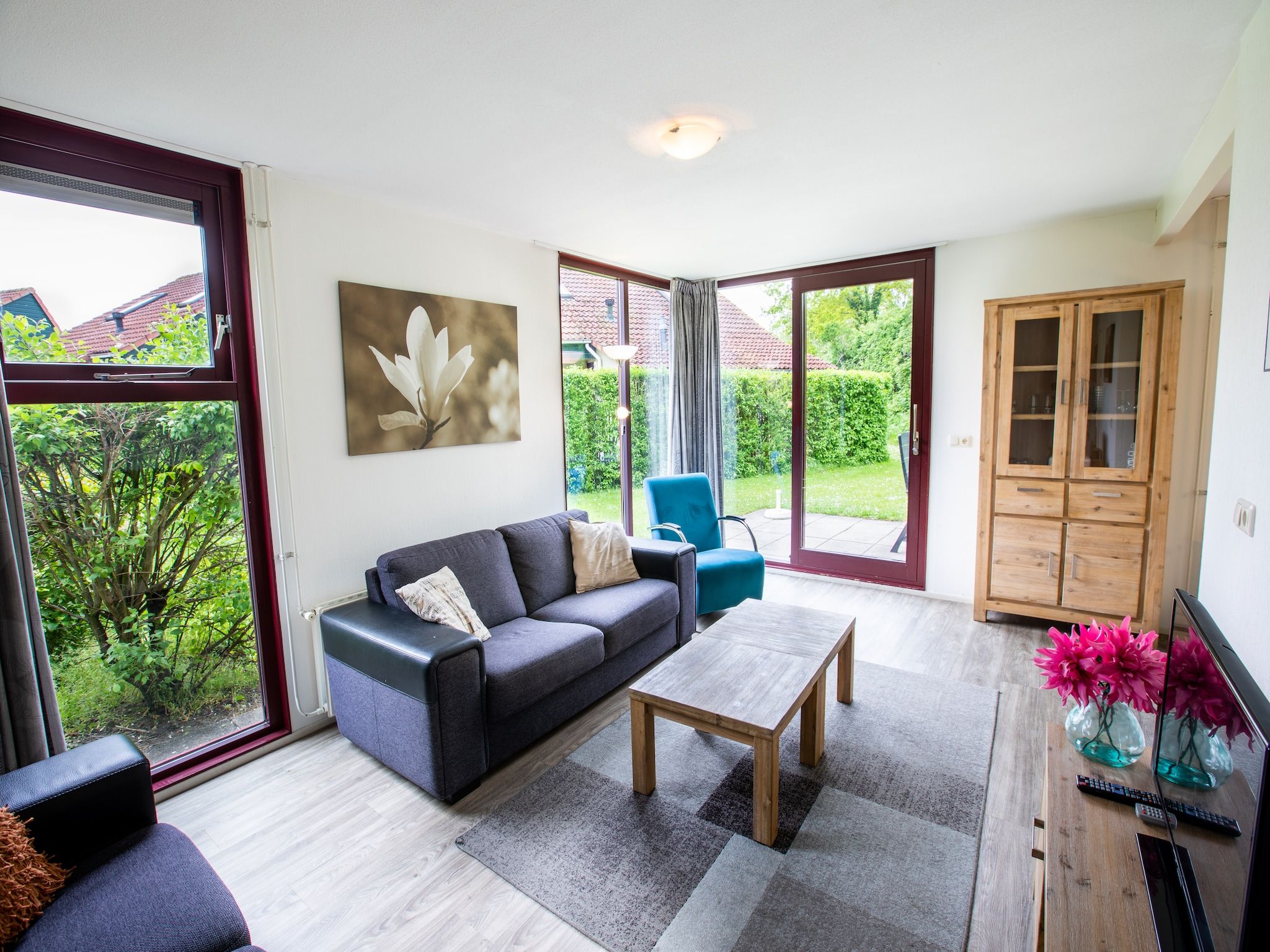 De woonkamer van Vakantiepark Hof van Zeeland 2 in Heinkenszand