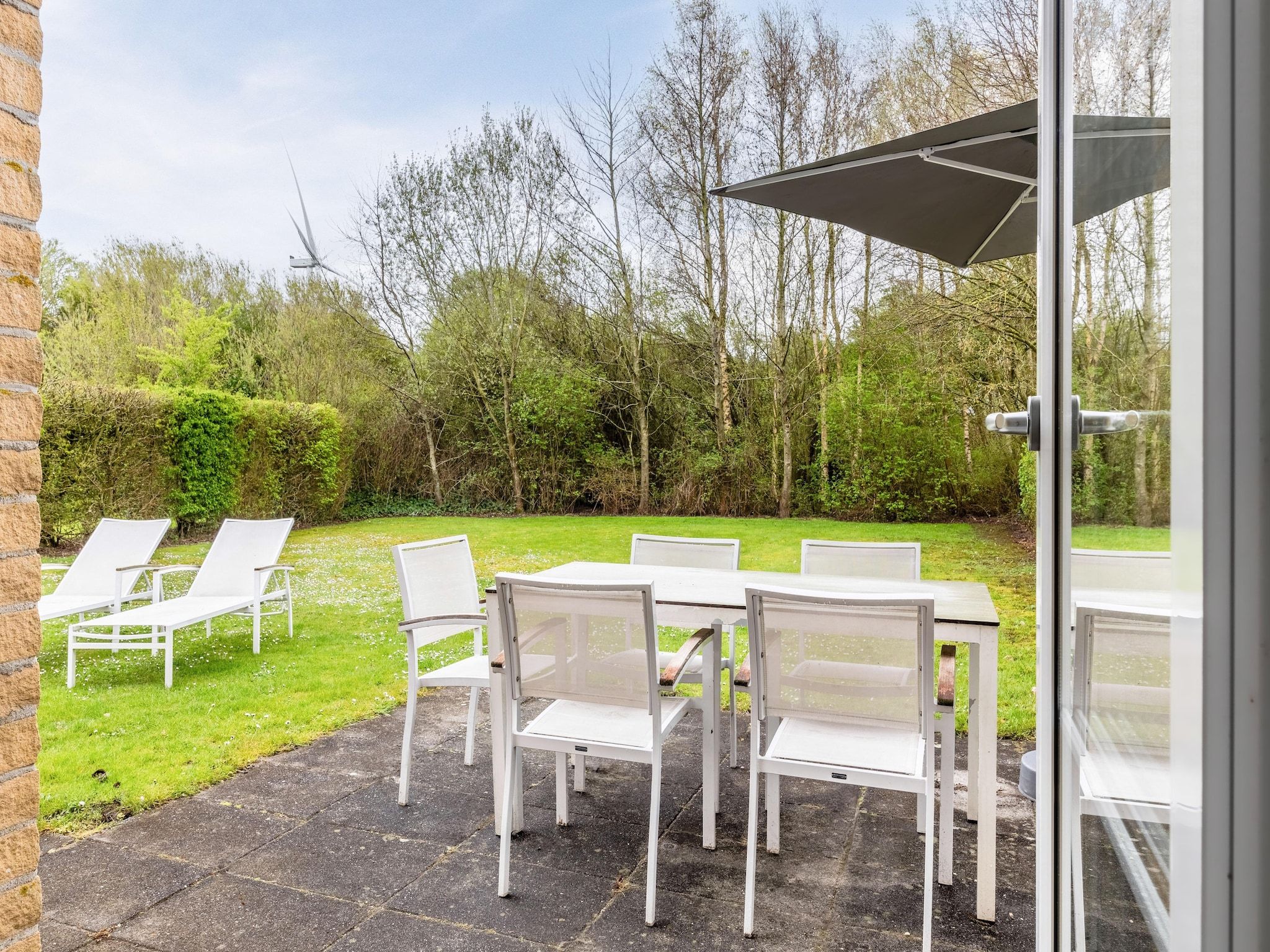 Het terras van Noordzee Résidence De Banjaard 21 in Kamperland