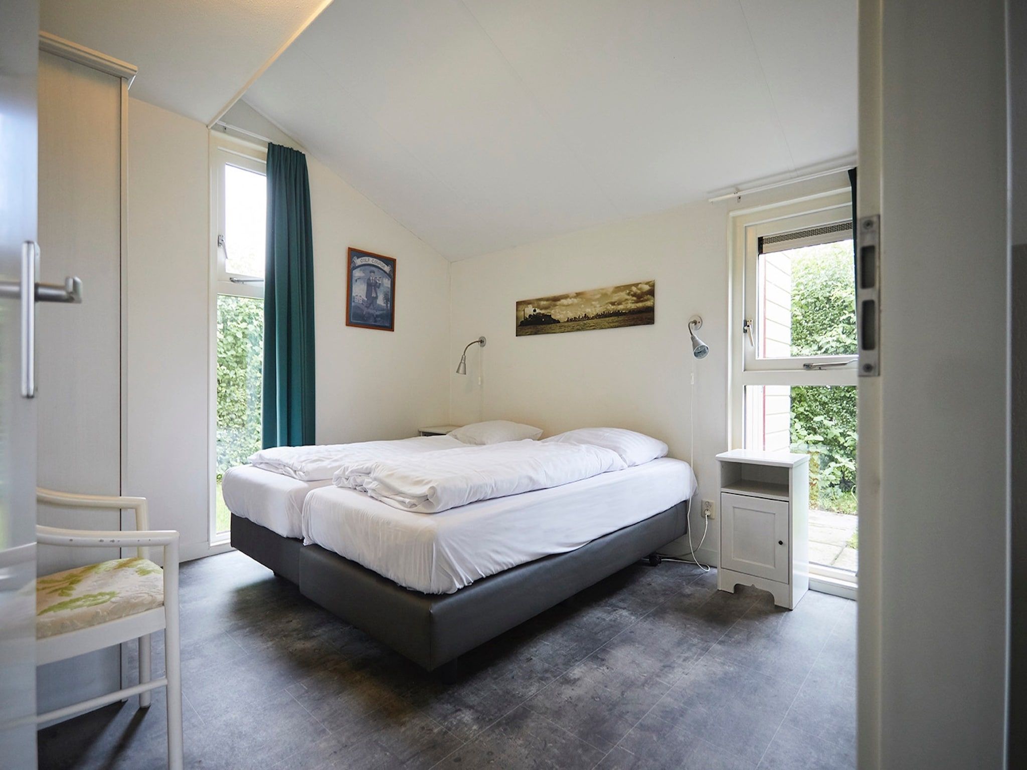 Een slaapkamer van Vakantiepark Hof van Zeeland 3 in Heinkenszand