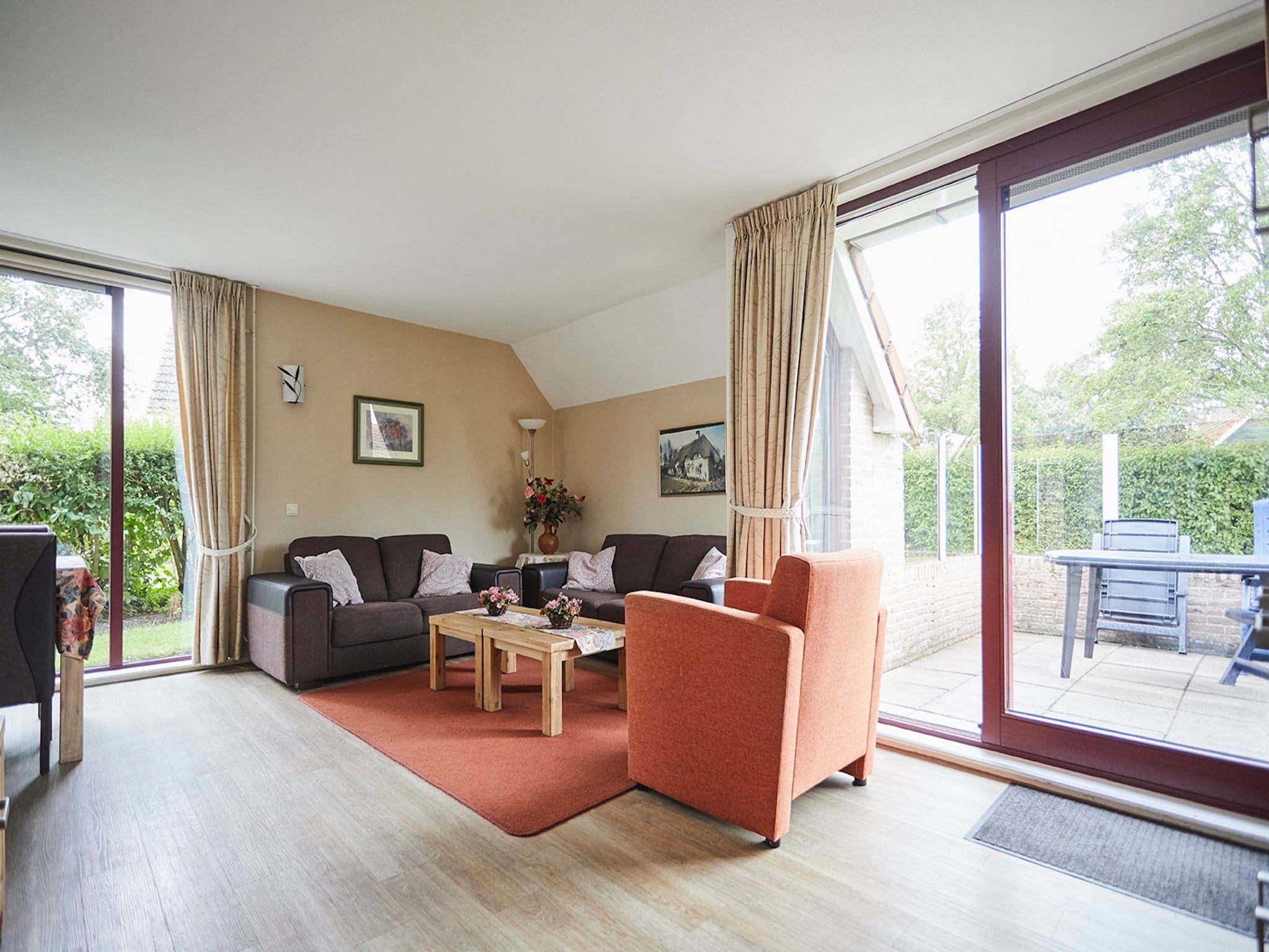 De woonkamer van Vakantiepark Hof van Zeeland 4 in Heinkenszand