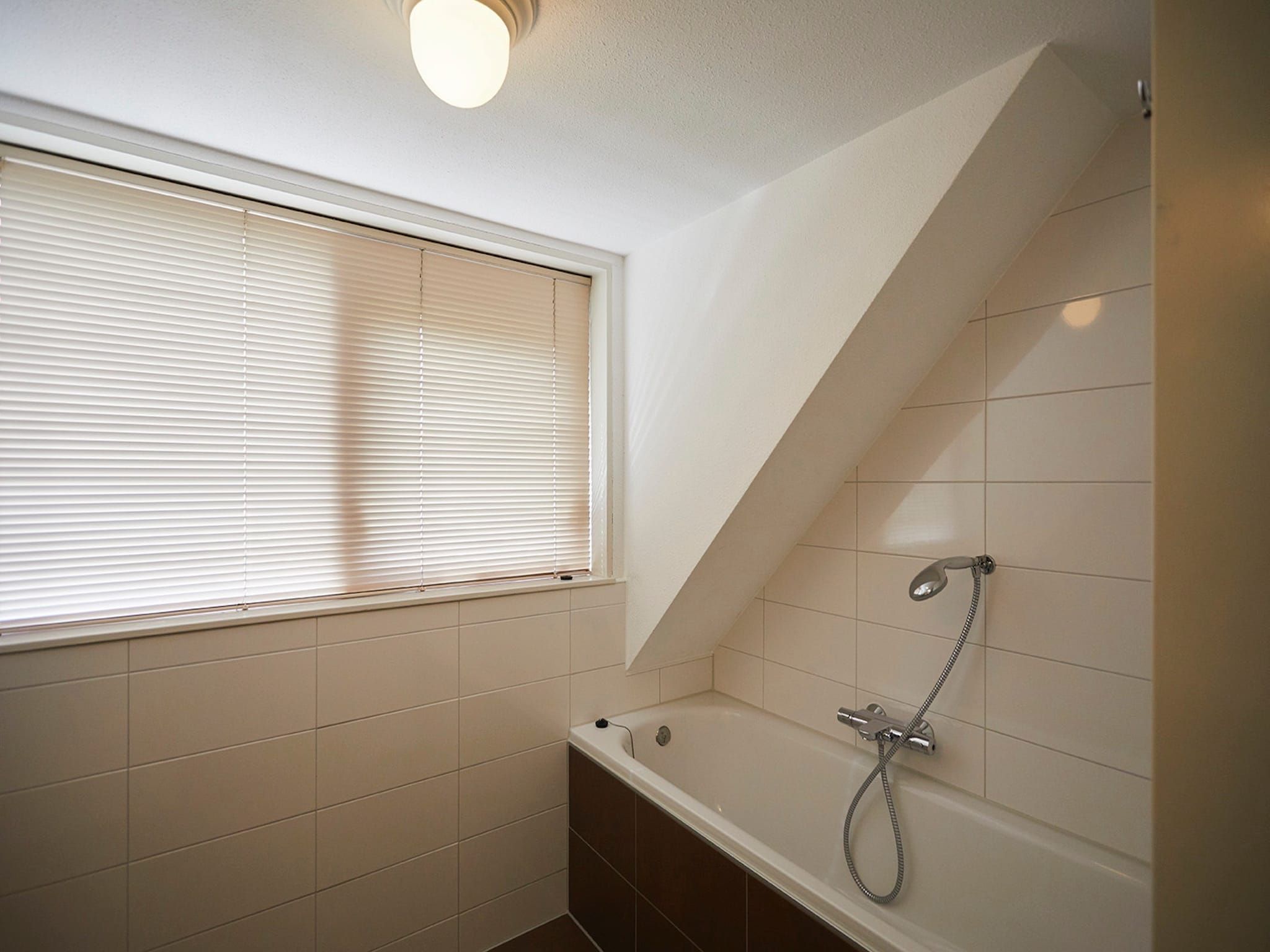 De badkamer van Vakantiepark Hof van Zeeland 5 in Heinkenszand