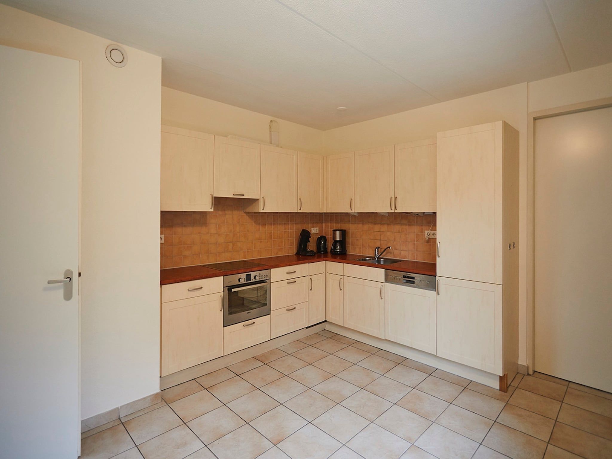 De keuken van Vakantiepark Hof van Zeeland  8 in Heinkenszand