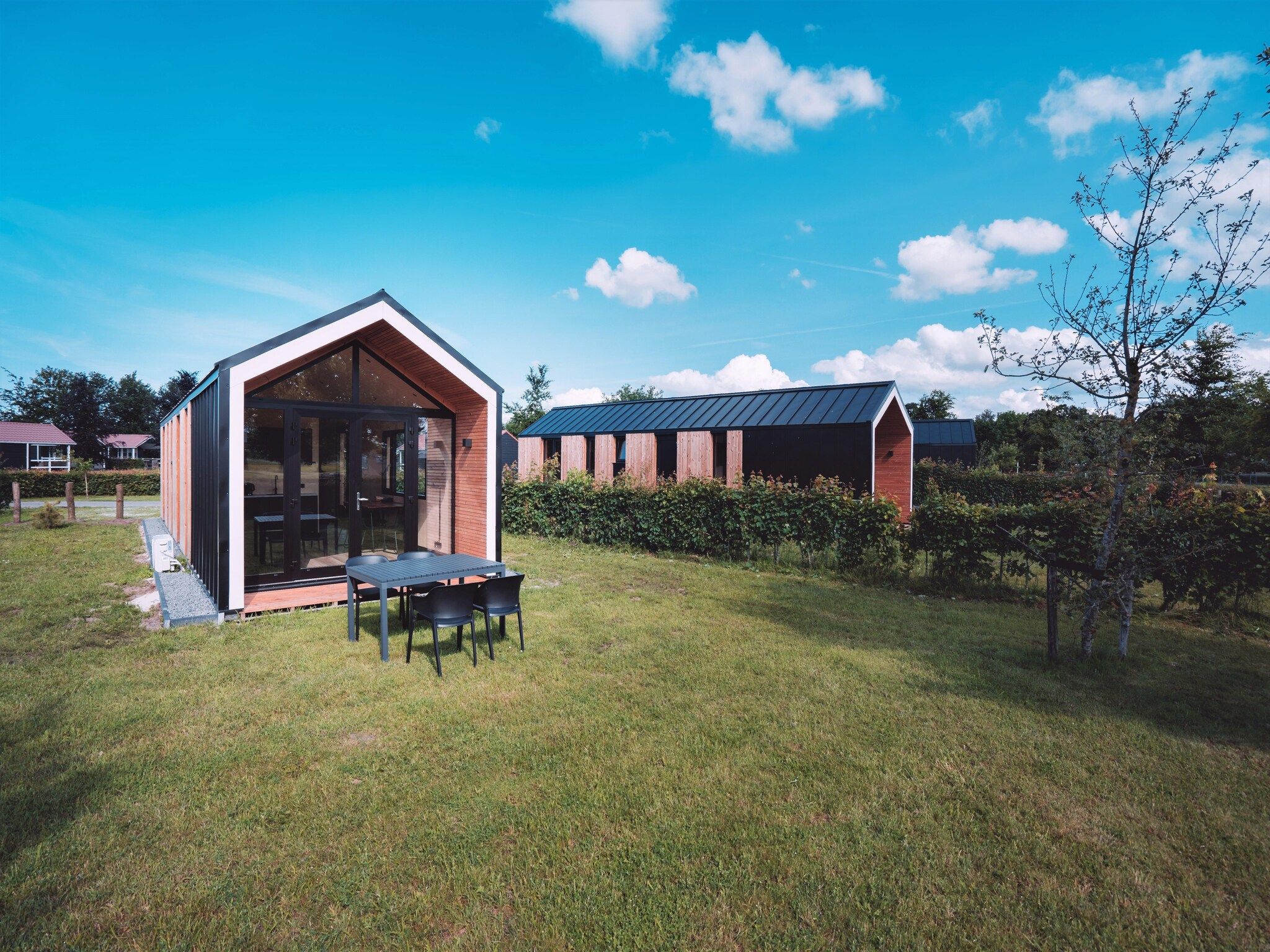 De tuin van Vakantiepark Eigen Wijze 11 in Bant