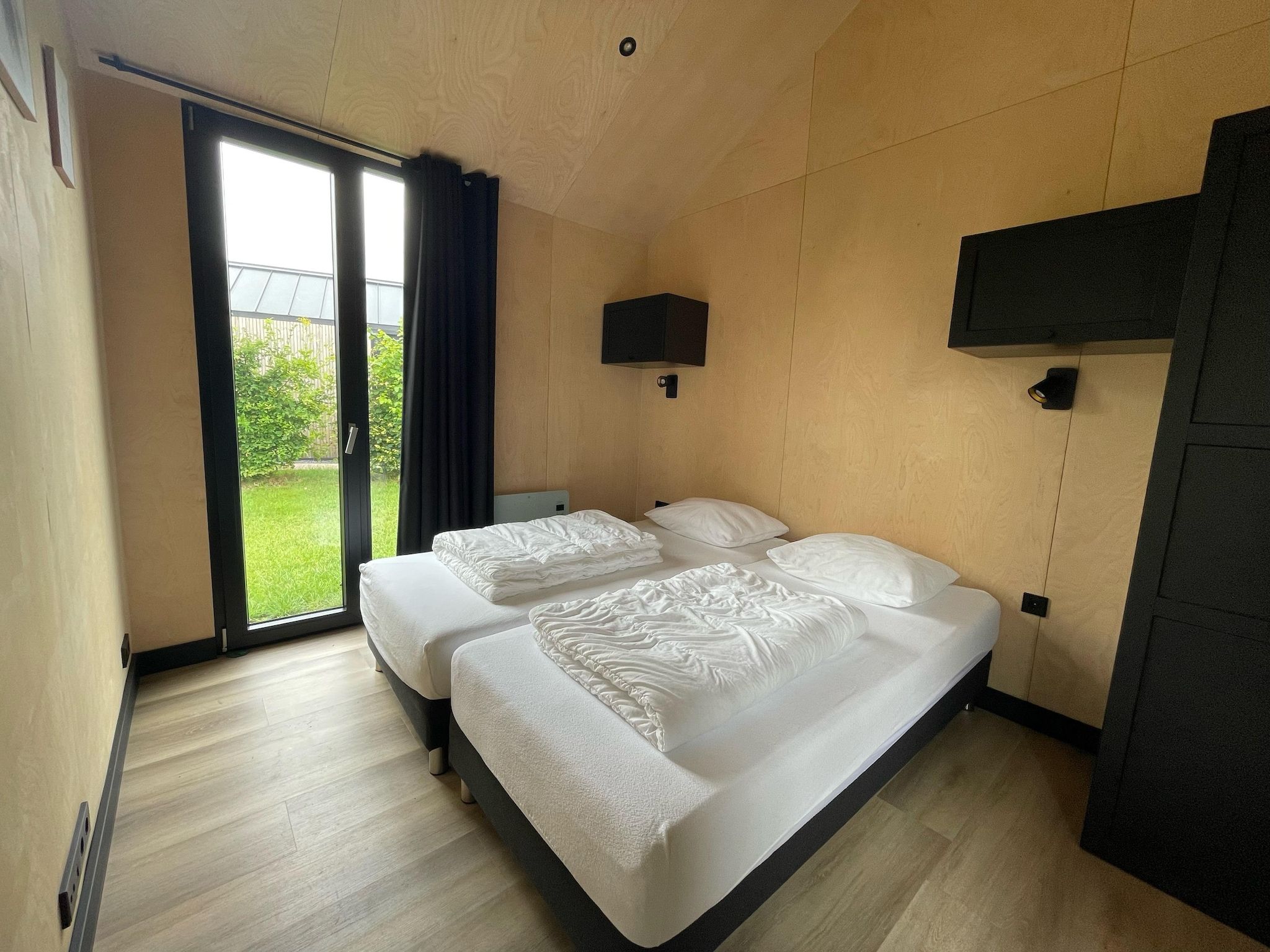 Een slaapkamer van Vakantiepark Eigen Wijze 11 in Bant