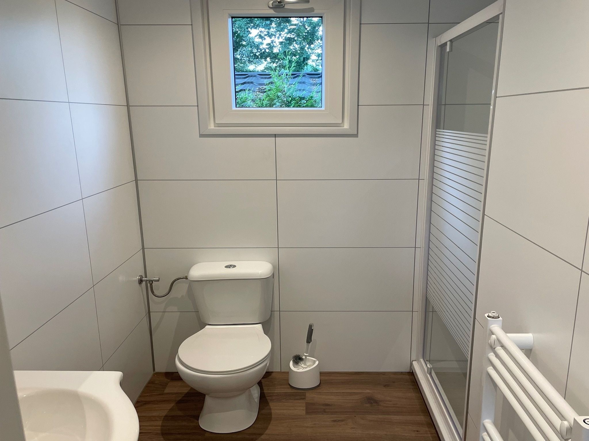 De badkamer van Recreatiepark Rhederlaagse Meren 1 in Lathum