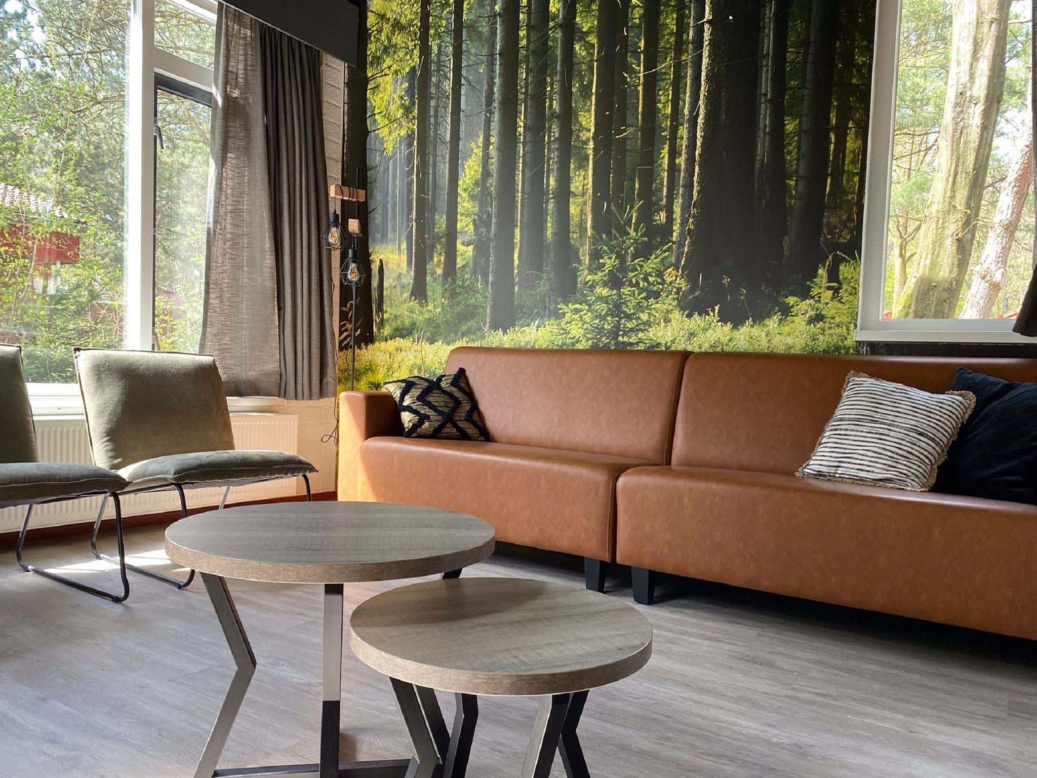 De woonkamer van Vakantiepark Weerterbergen 14 in Weert