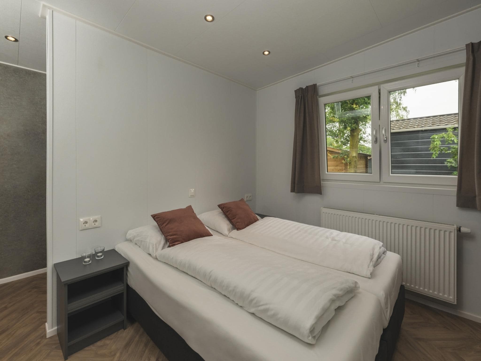 Een slaapkamer van Vakantiepark Mölke 30 in Zuna