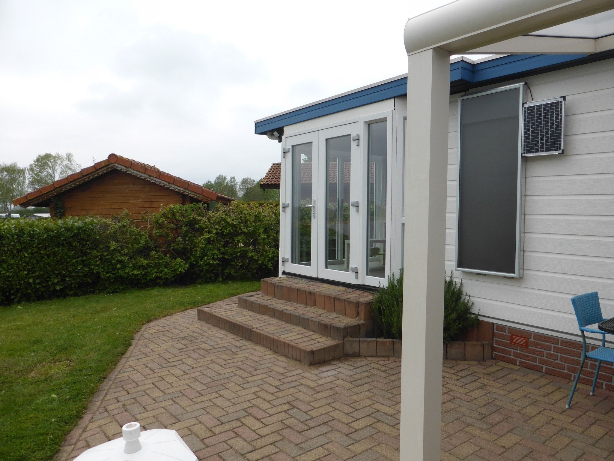 De tuin van Recreatiepark Rhederlaagse Meren 3 in Lathum