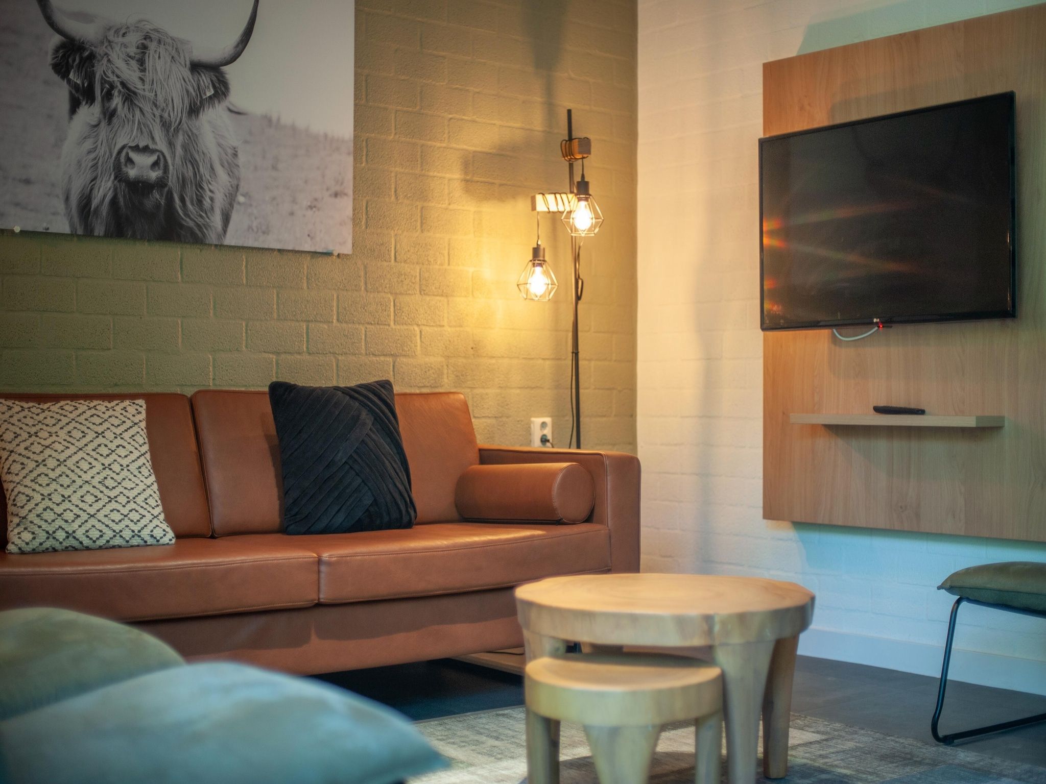 De woonkamer van Vakantiepark de Katjeskelder 23 in Oosterhout