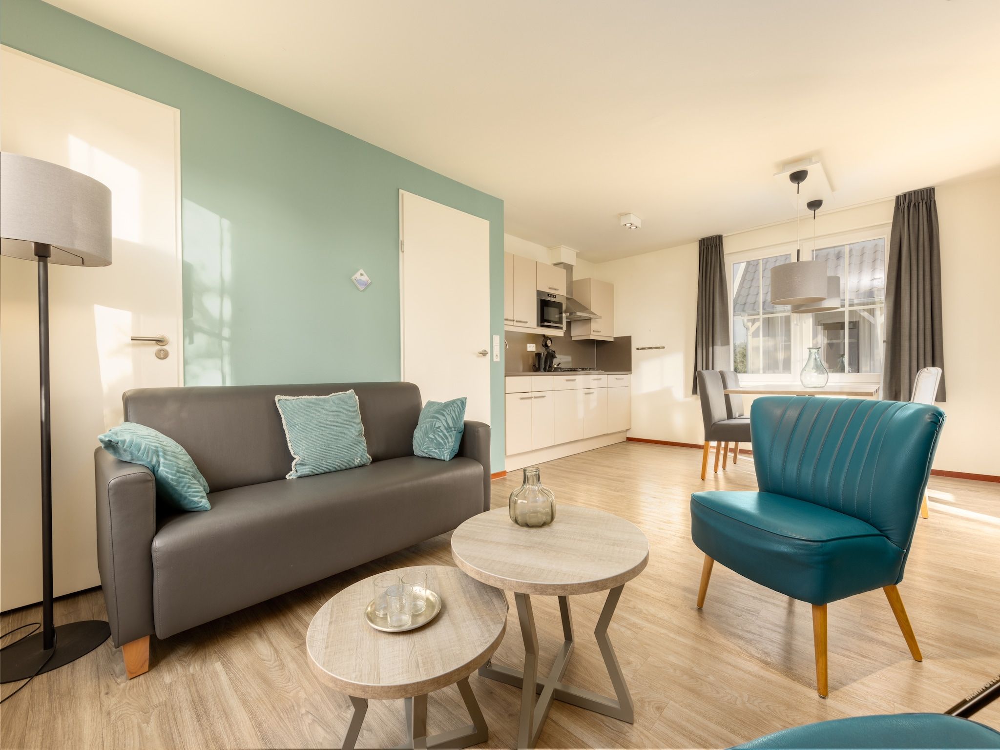 De woonkamer van Vakantiepark Klein Vink 10 in Arcen