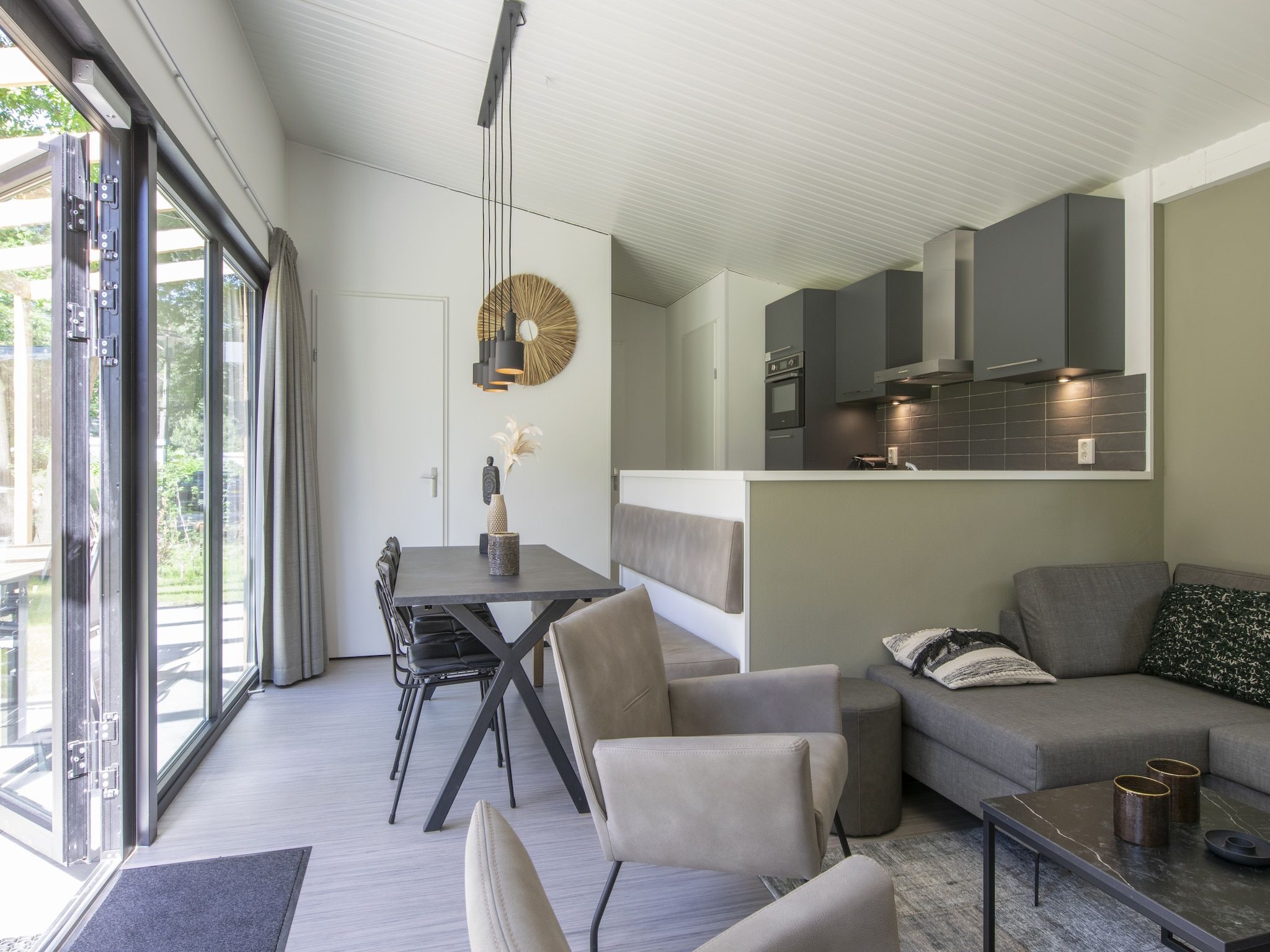 De woonkamer van Bospark 't Wolfsven 16 in Mierlo