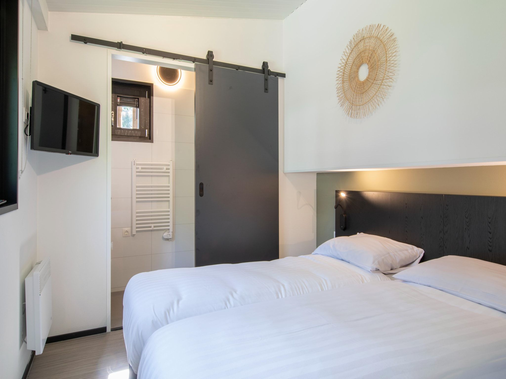 Een slaapkamer van Bospark 't Wolfsven 16 in Mierlo