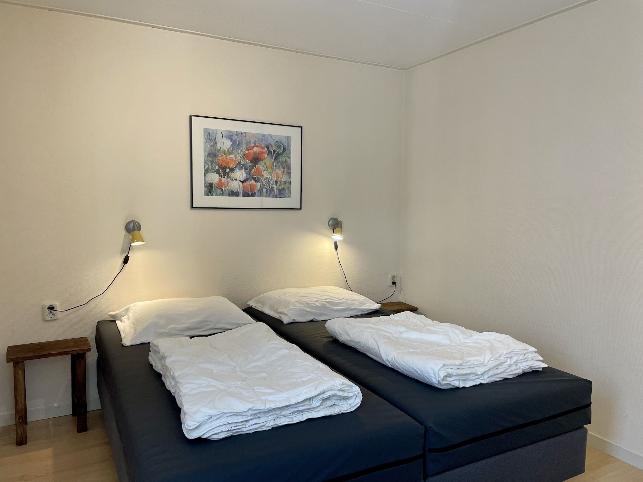 Een slaapkamer van Bungalowpark Campanula 1 in St. Maartenszee