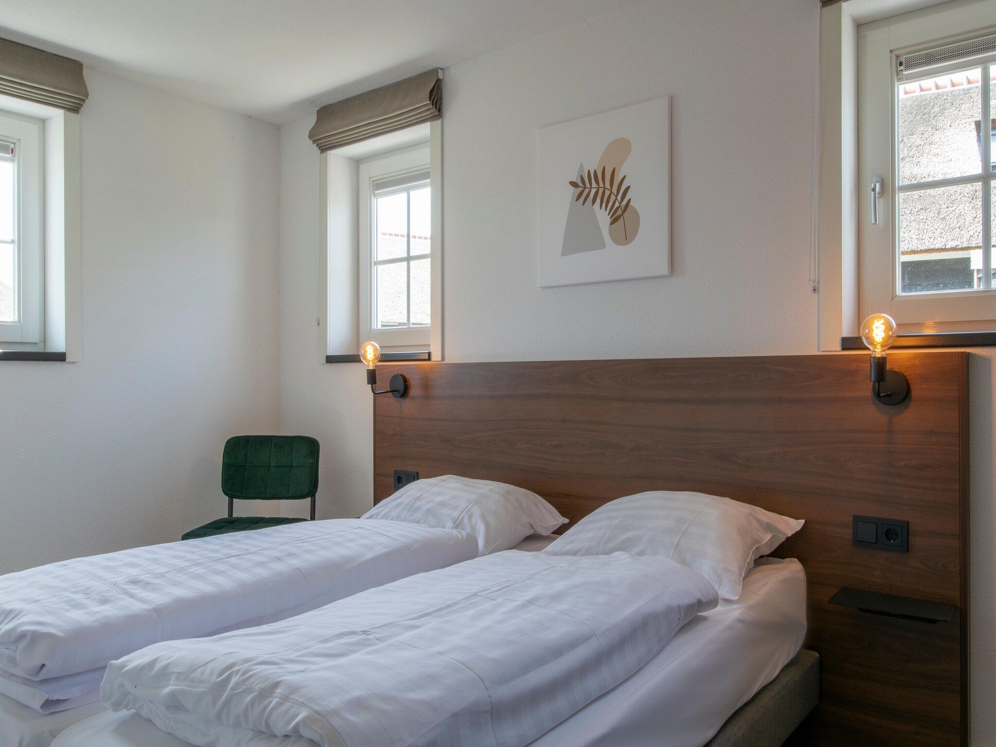 Een slaapkamer van Vakantiepark De Heihorsten 5 in Someren