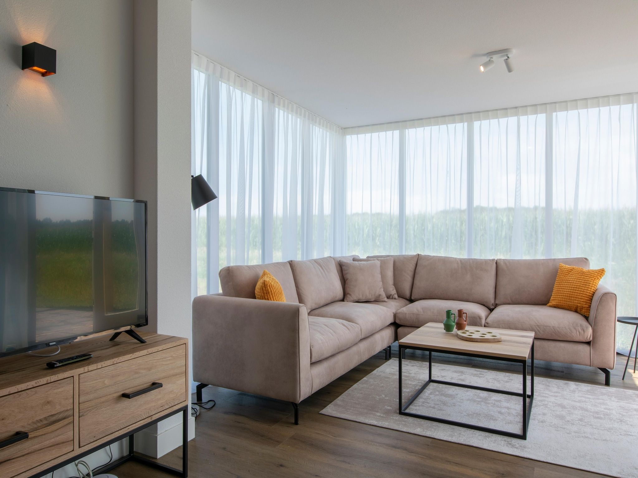 De woonkamer van Vakantiepark De Heihorsten 5 in Someren