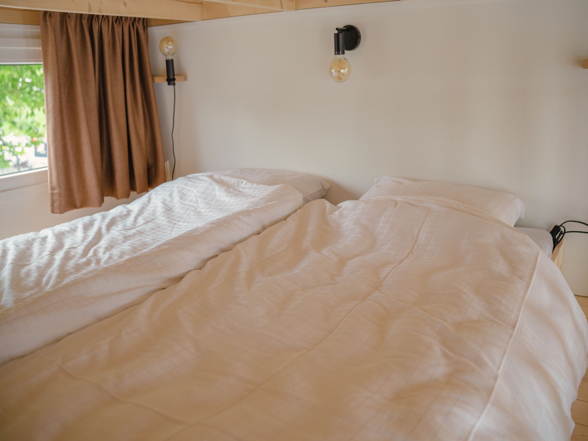 Een slaapkamer van MarinaPark Bad Nederrijn 4 in Maurik