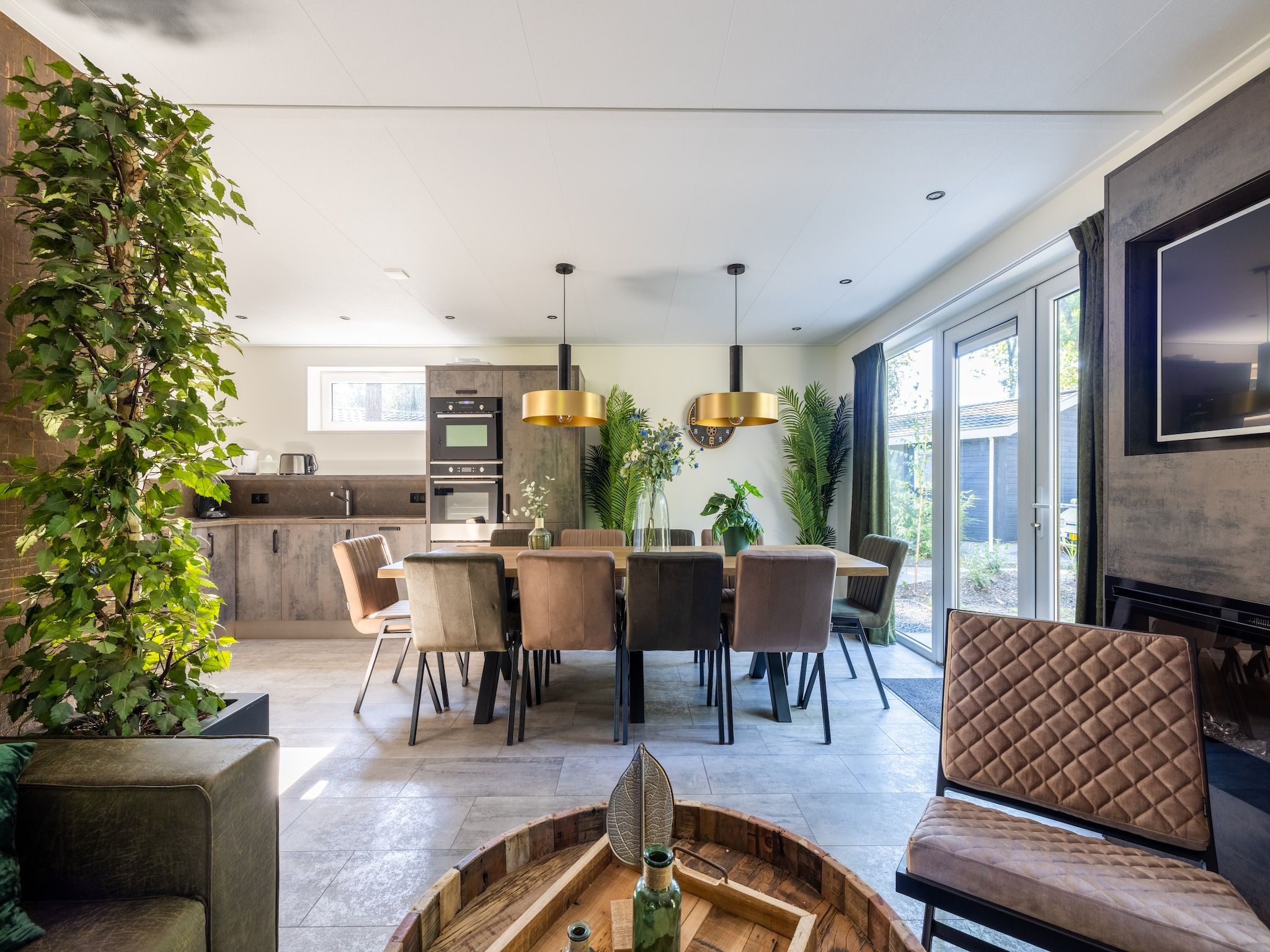 De woonkamer van Vakantiepark De Rimboe & De Woeste Hoogte 38 in Hoenderloo