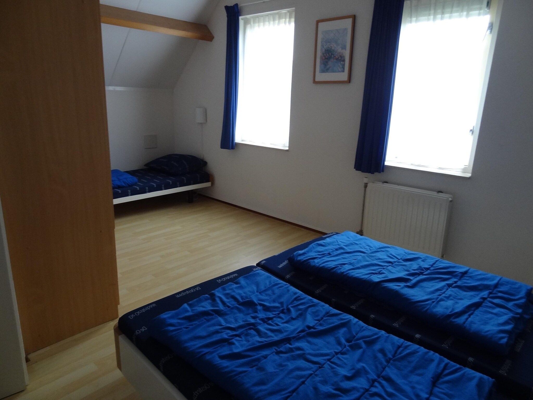 Een slaapkamer van Villapark De Oesterbaai 15 in Wemeldinge