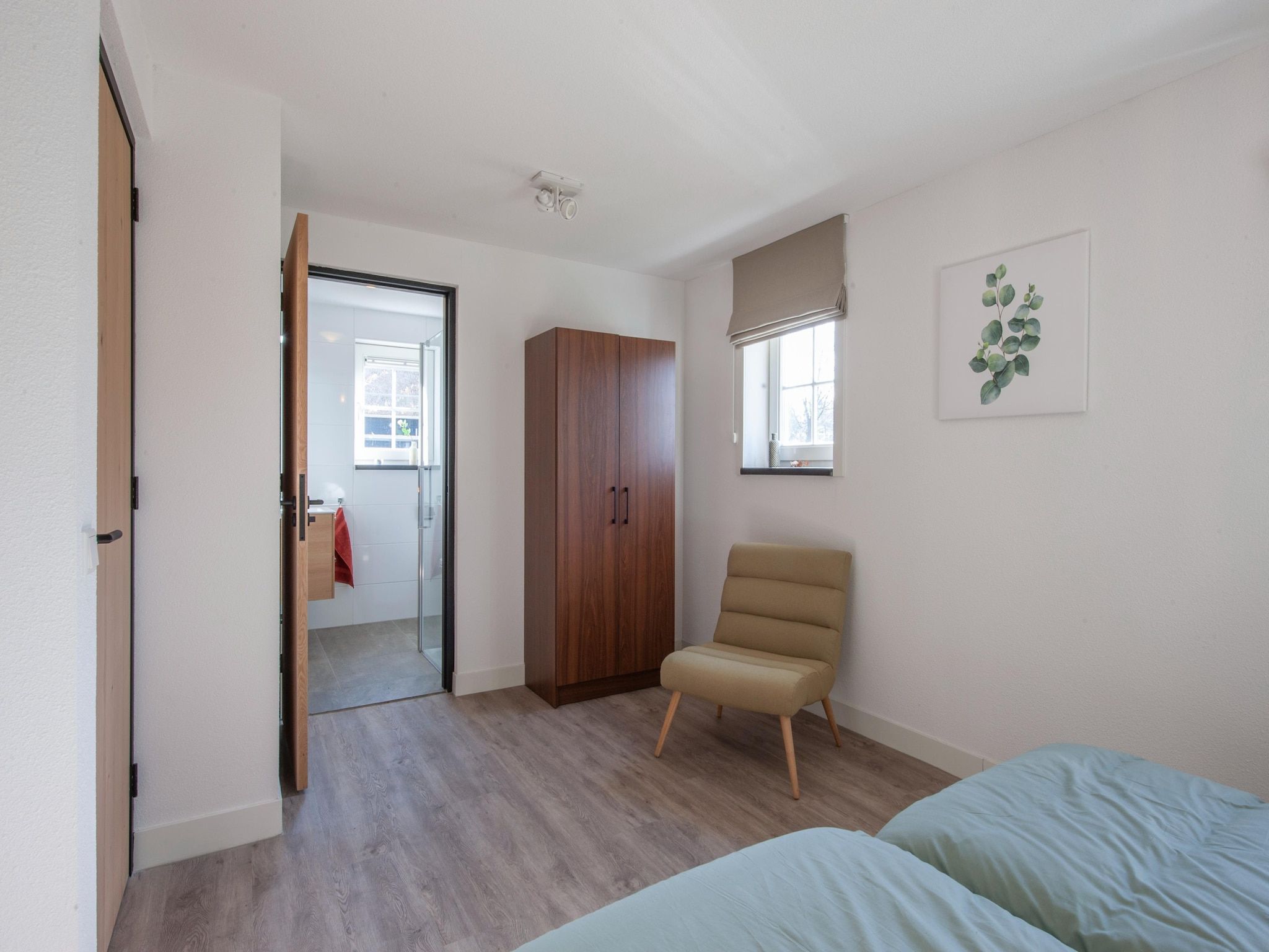 Een slaapkamer van Vakantiepark De Heihorsten 6 in Someren