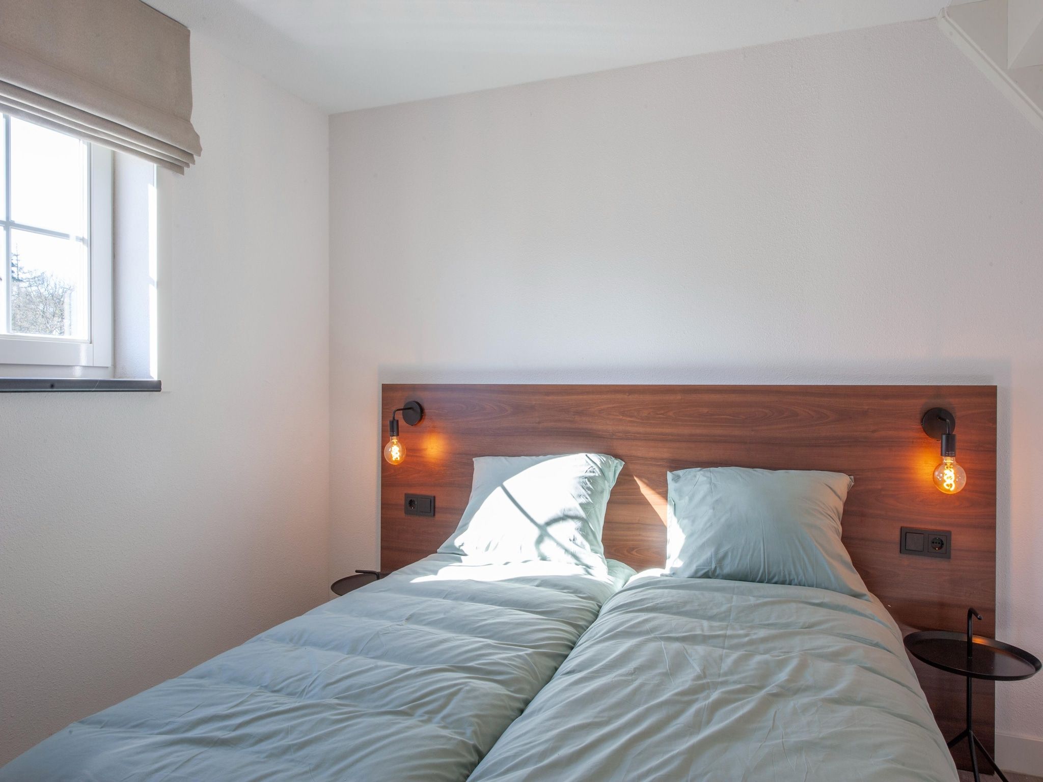 Een slaapkamer van Vakantiepark De Heihorsten 6 in Someren