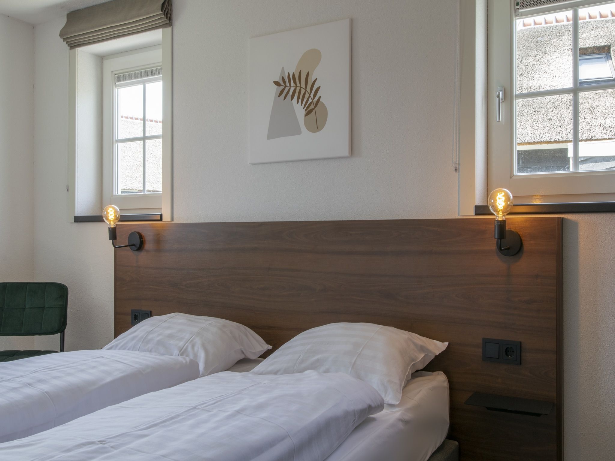 Een slaapkamer van Vakantiepark De Heihorsten 10 in Someren