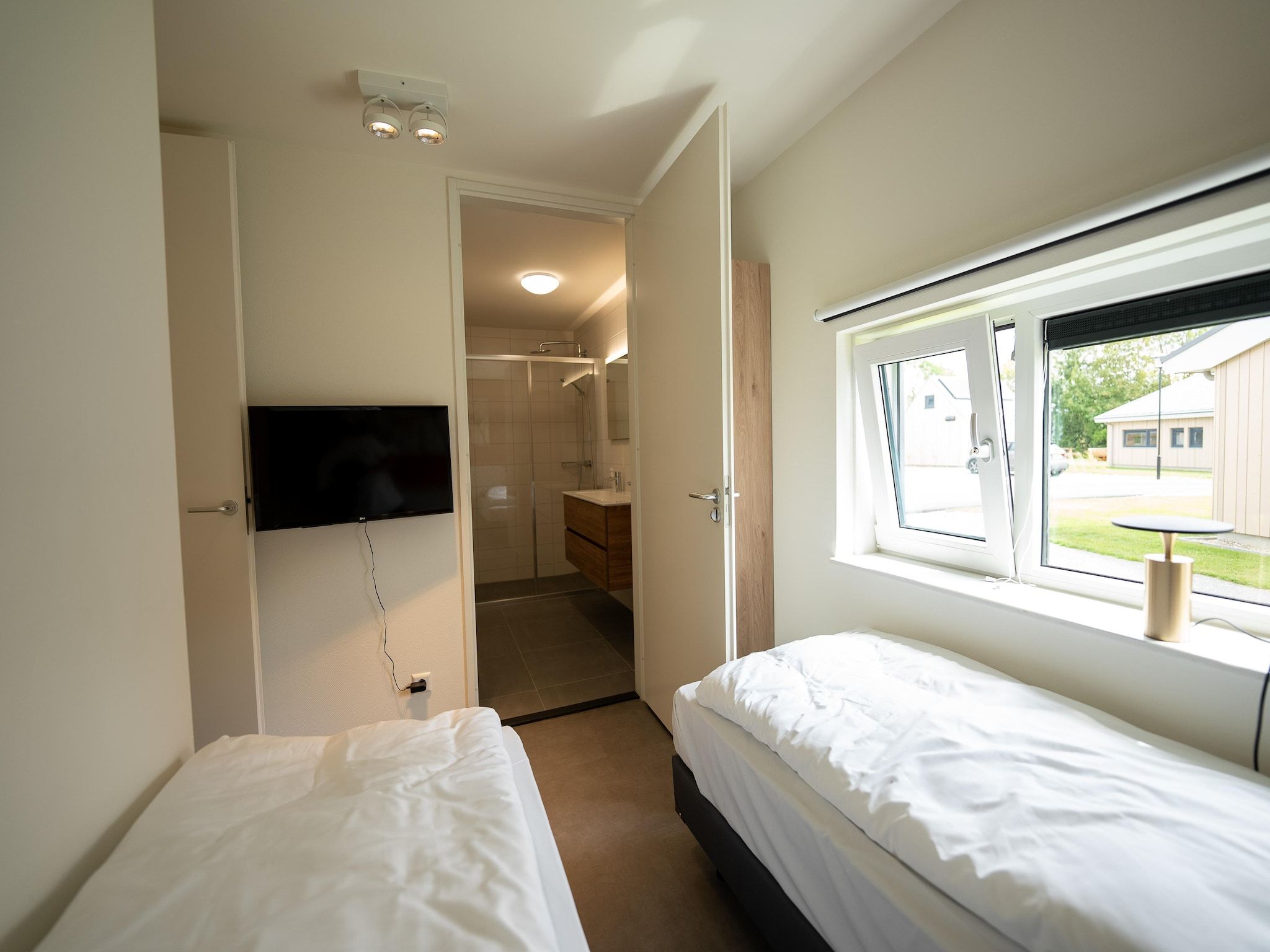 Een slaapkamer van Vakantiepark Zeebad 14 in Breskens