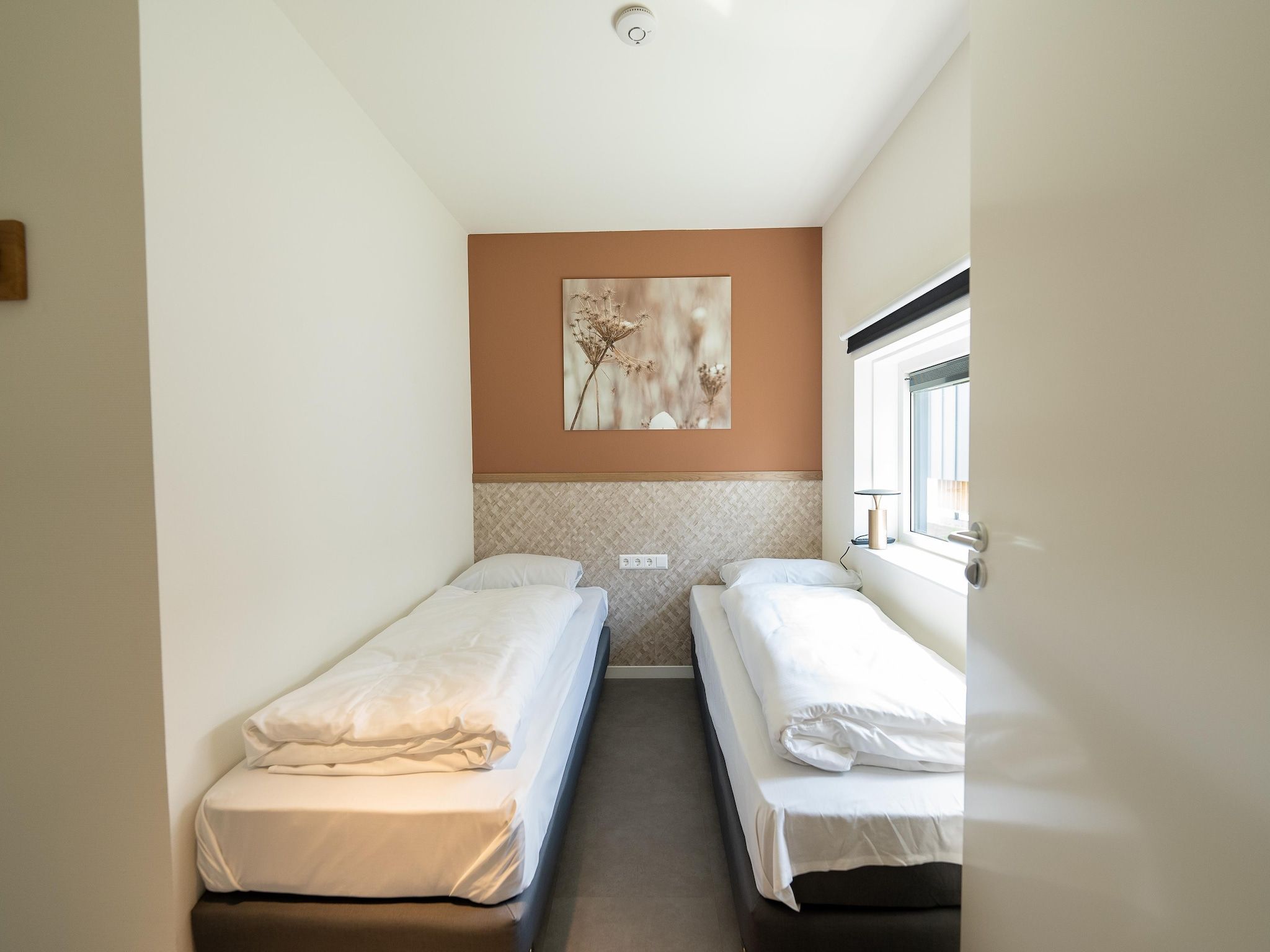 Een slaapkamer van Vakantiepark Zeebad 15 in Breskens