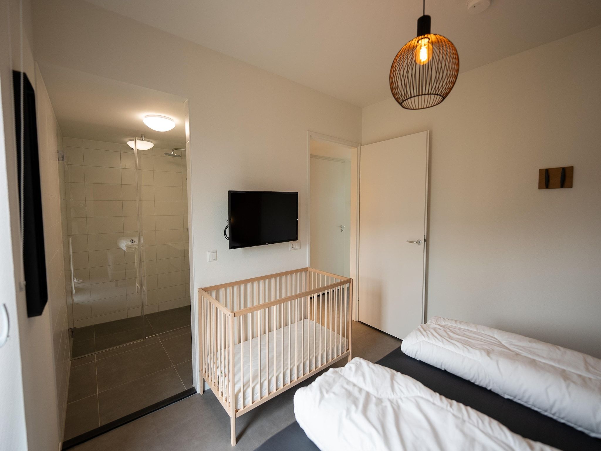 Een slaapkamer van Vakantiepark Zeebad 16 in Breskens