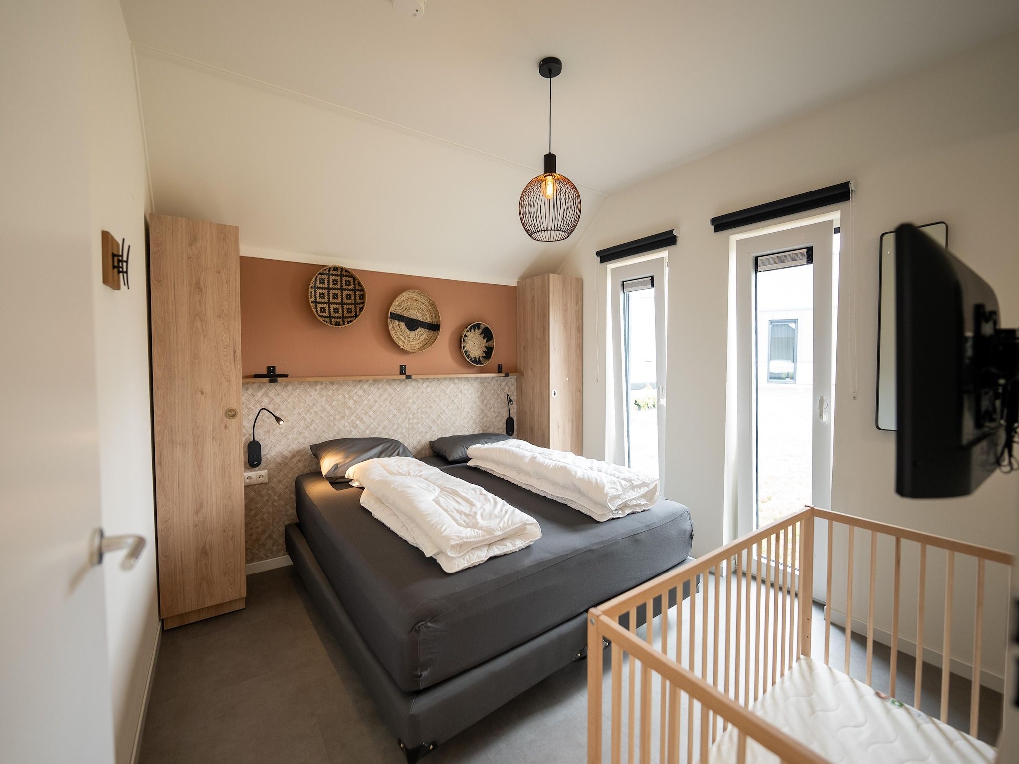 Een slaapkamer van Vakantiepark Zeebad 16 in Breskens