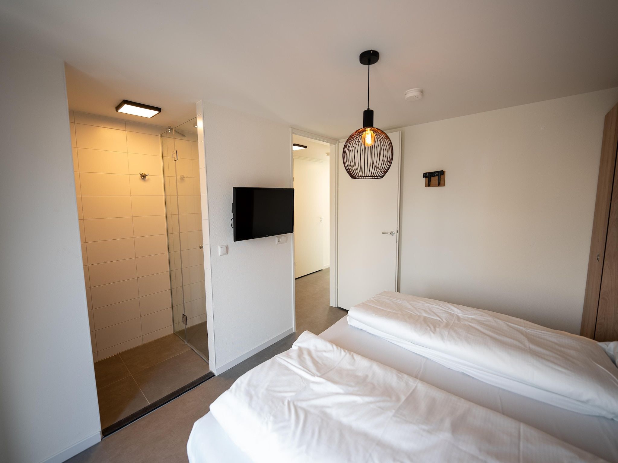 Een slaapkamer van Vakantiepark Zeebad 17 in Breskens